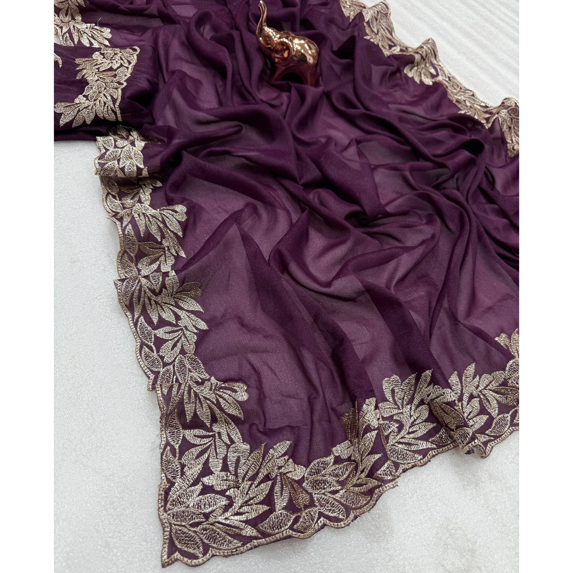 Stylish Wine Star Chiffon Saree with Traditional Zari Embellished Border
