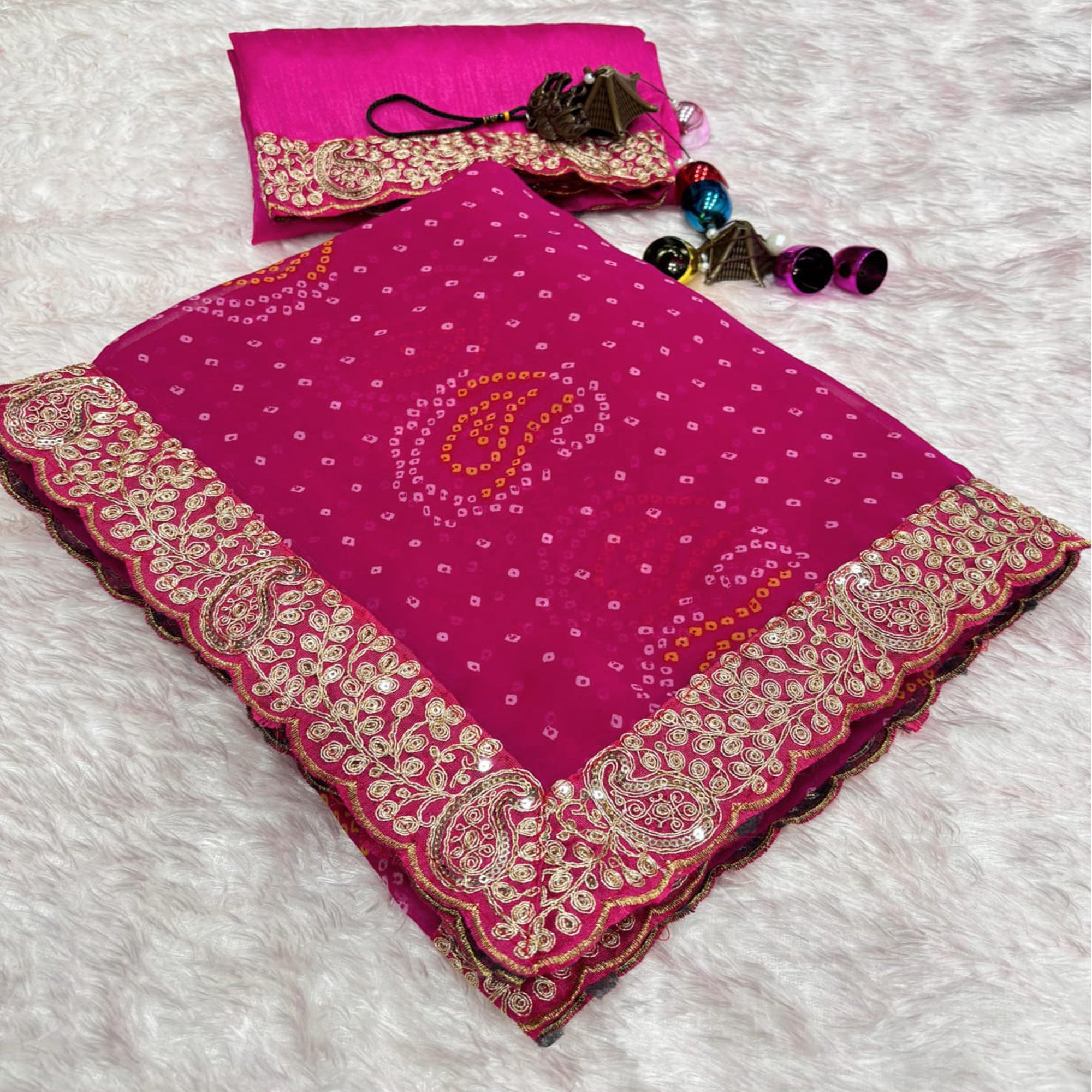 Pink Bandhani Printed Georgette Saree With Embroidered Border