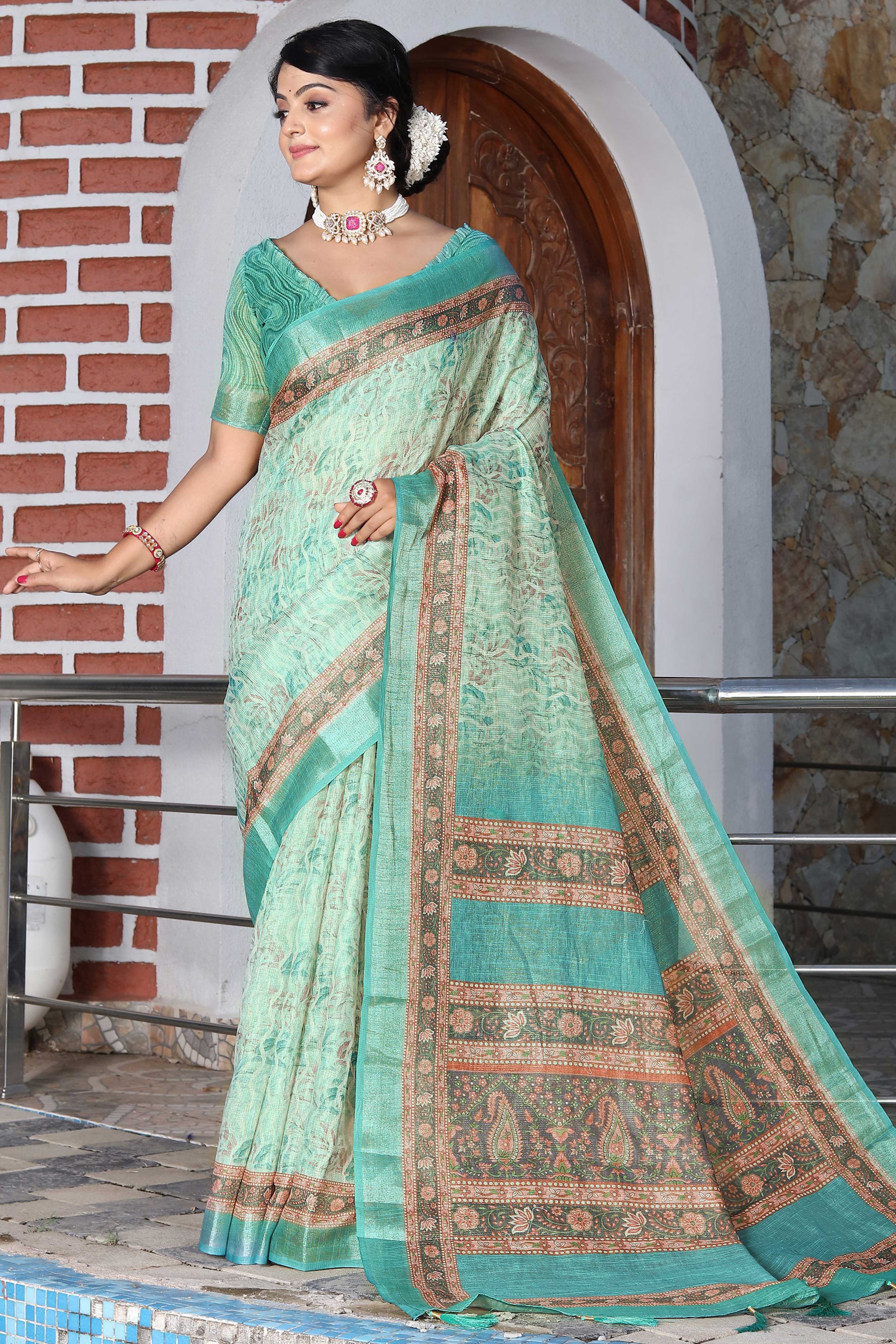 Beautiful Mint Green Tissue Handloom Saree with Detailed Digital Floral Embellishments