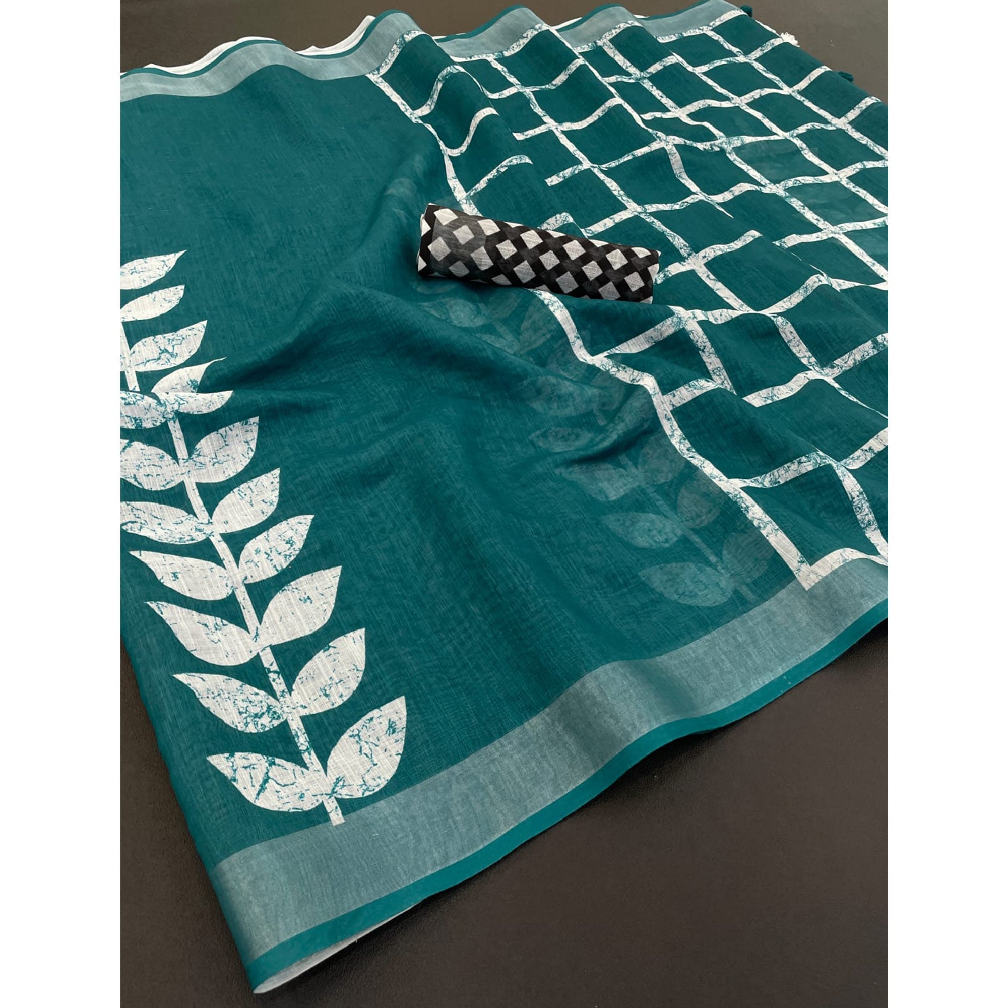 Teal Printed Linen Cotton Saree With Delicate Tassel Detailing
