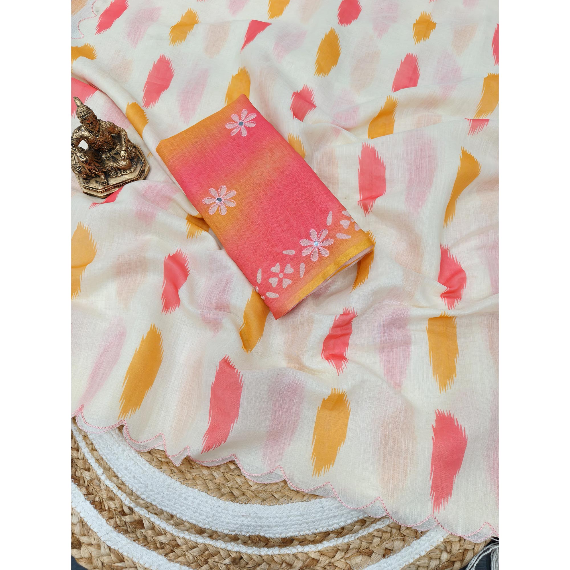 Cream Colored Linen Saree with Traditonal Ikkat Pattern Detailing