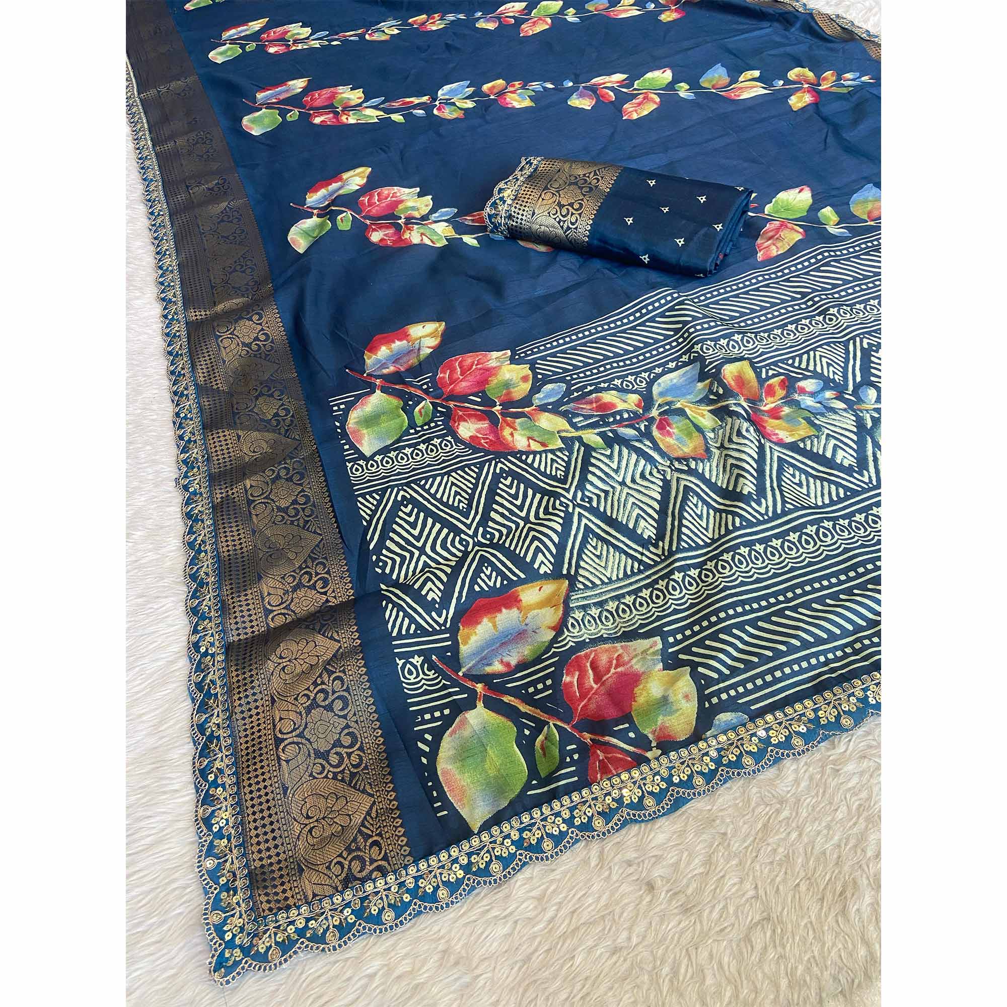 Blue Floral Printed Dola Silk Saree Accentuated with a Traditional Woven Border