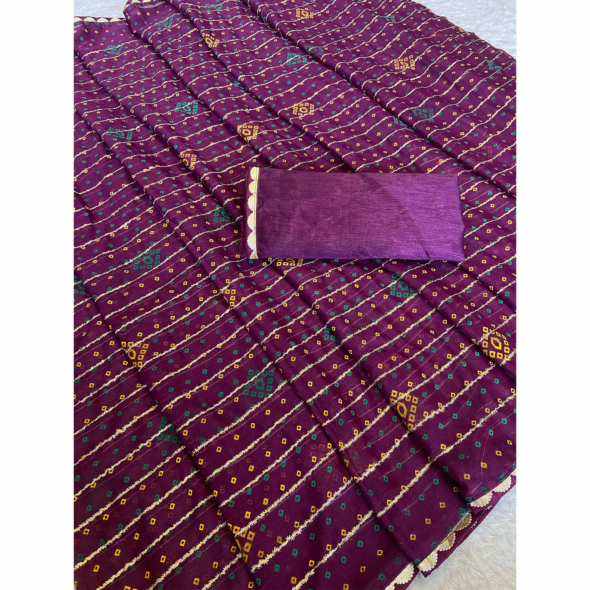 Purple Bandhani Printed Chiffon Saree with Graceful Touches of Zari Work