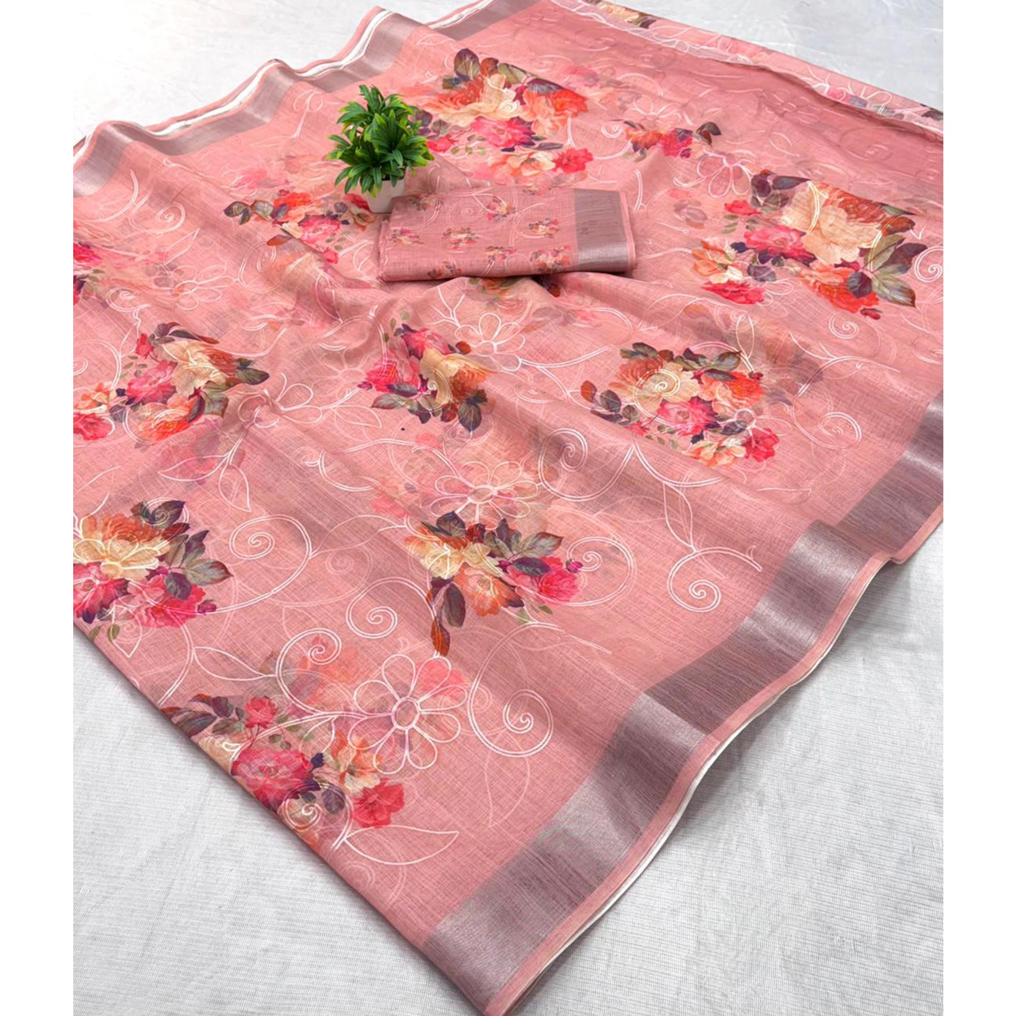 Peach Floral Printed Linen Cotton Saree with Subtle Texture and Thread Work Highlights