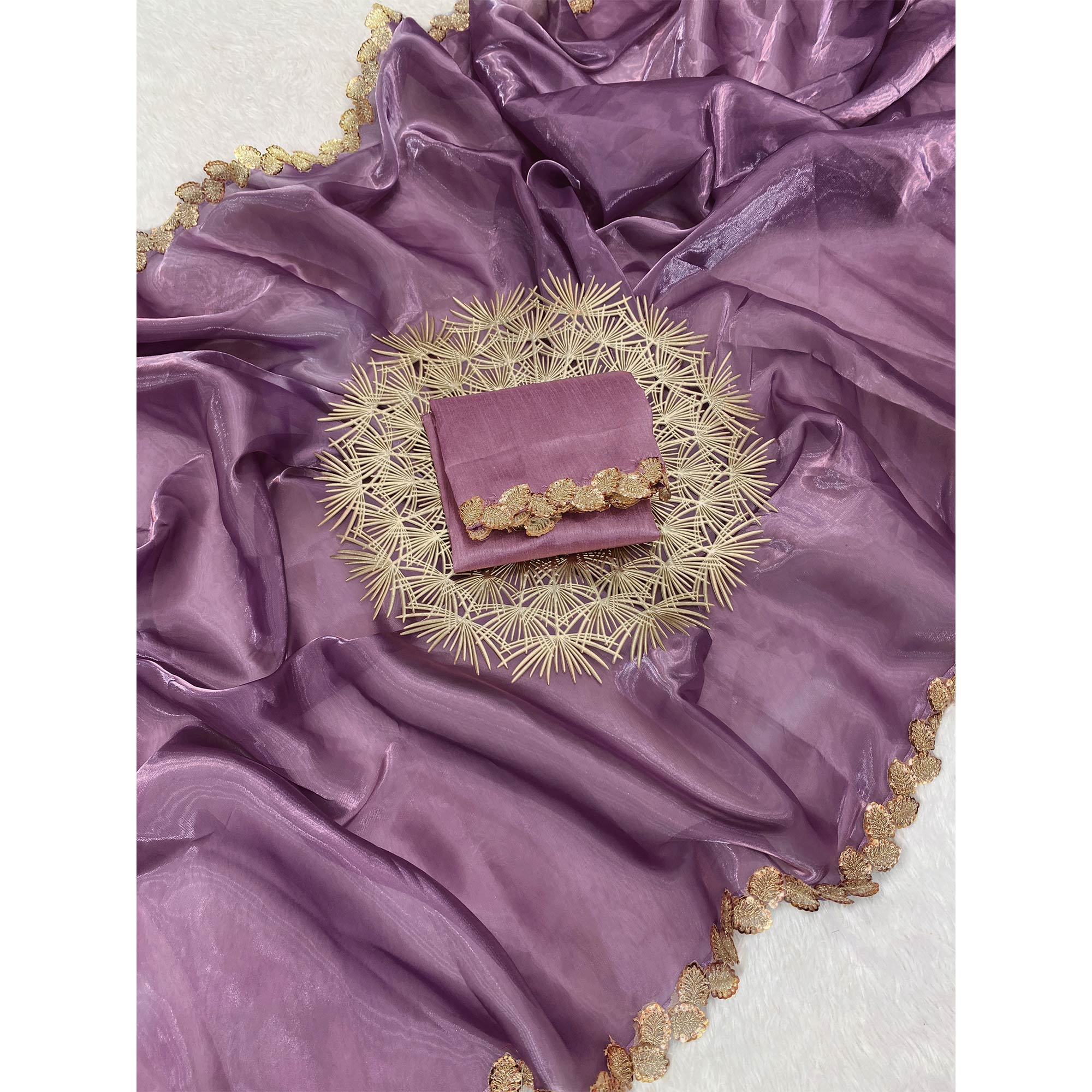Purple Tissue Saree Featuring Solid Finish and Delicate Lace Work by Jimmy Choo Style