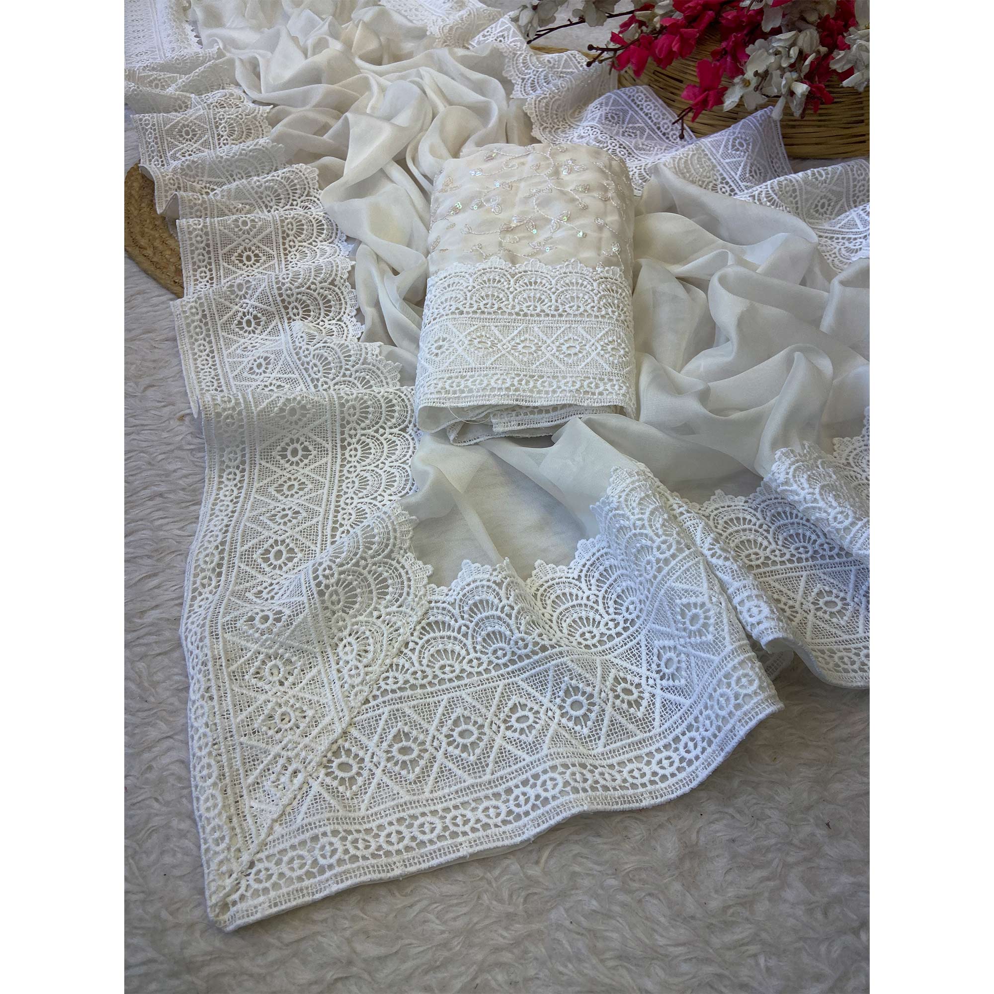 White Solid Satin Rangoli Saree Enhanced with Intricate Embroidered Border Work