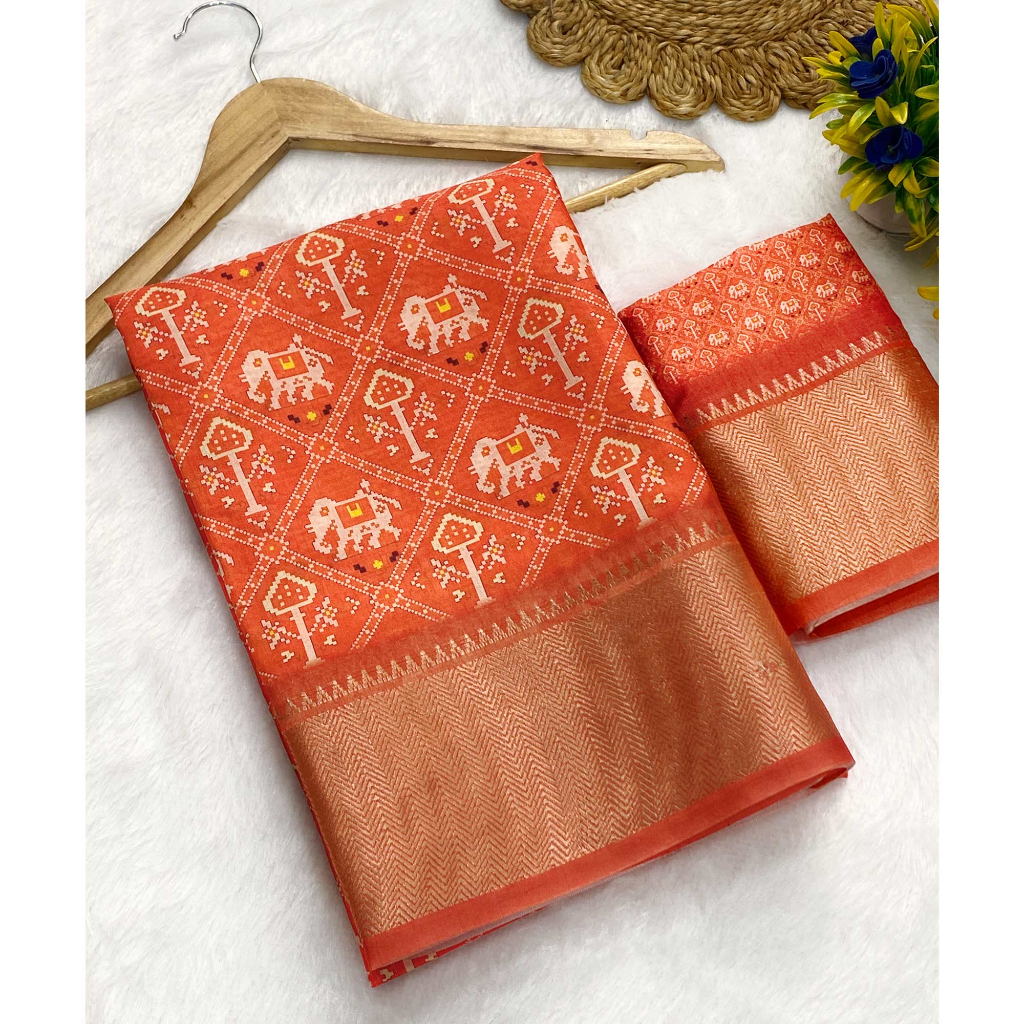 Orange Dola Silk Saree Featuring Traditional Patan Patola Print