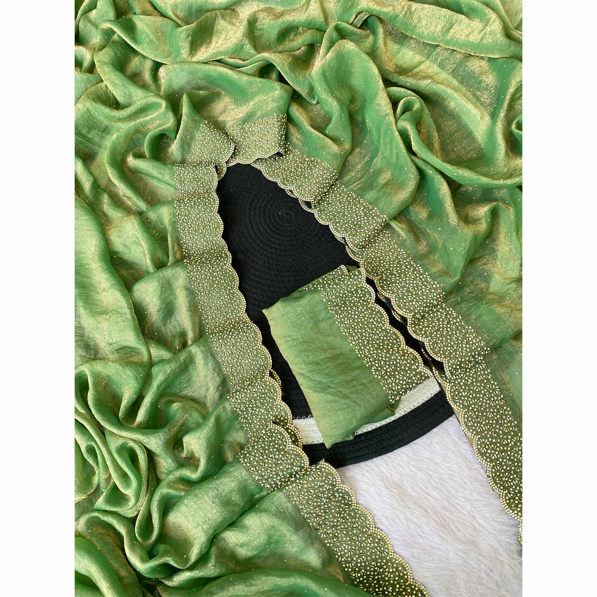 Green Fandy Satin Saree Featuring Intricate Swarovski Work & Decorative Zarkan Border