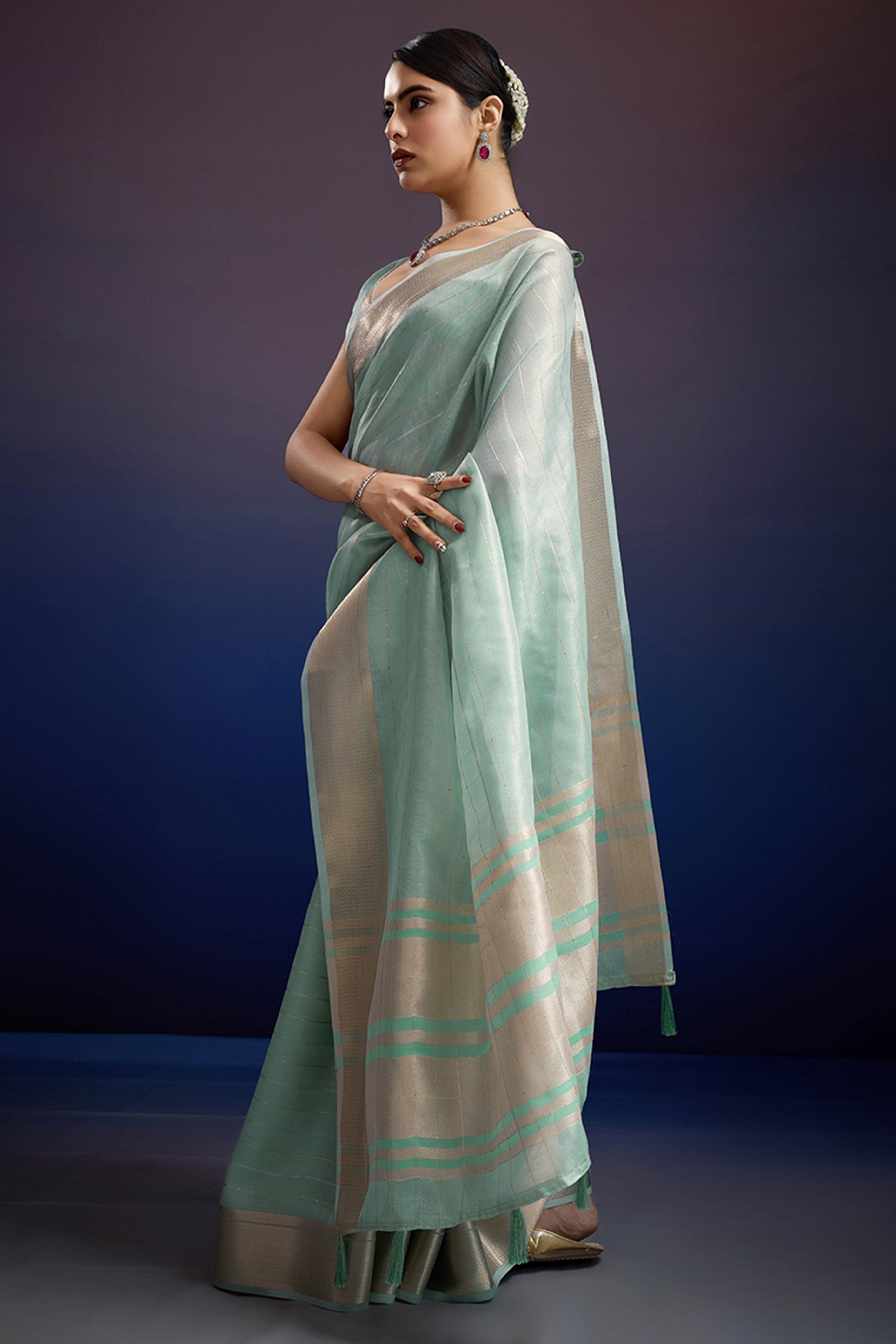 Mint Green Pure Linen Saree with Gold Toned Zari Weave