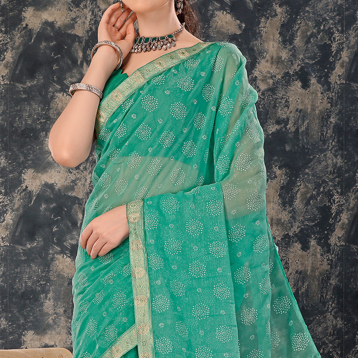 Turquoise Printed Chiffon Saree With Lace Border