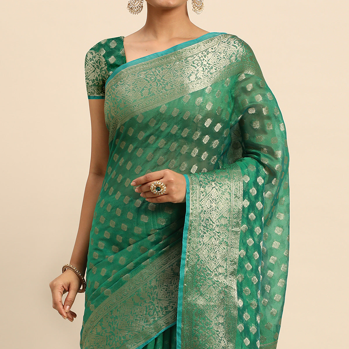 Green Woven Organza Silk Saree With Tassels