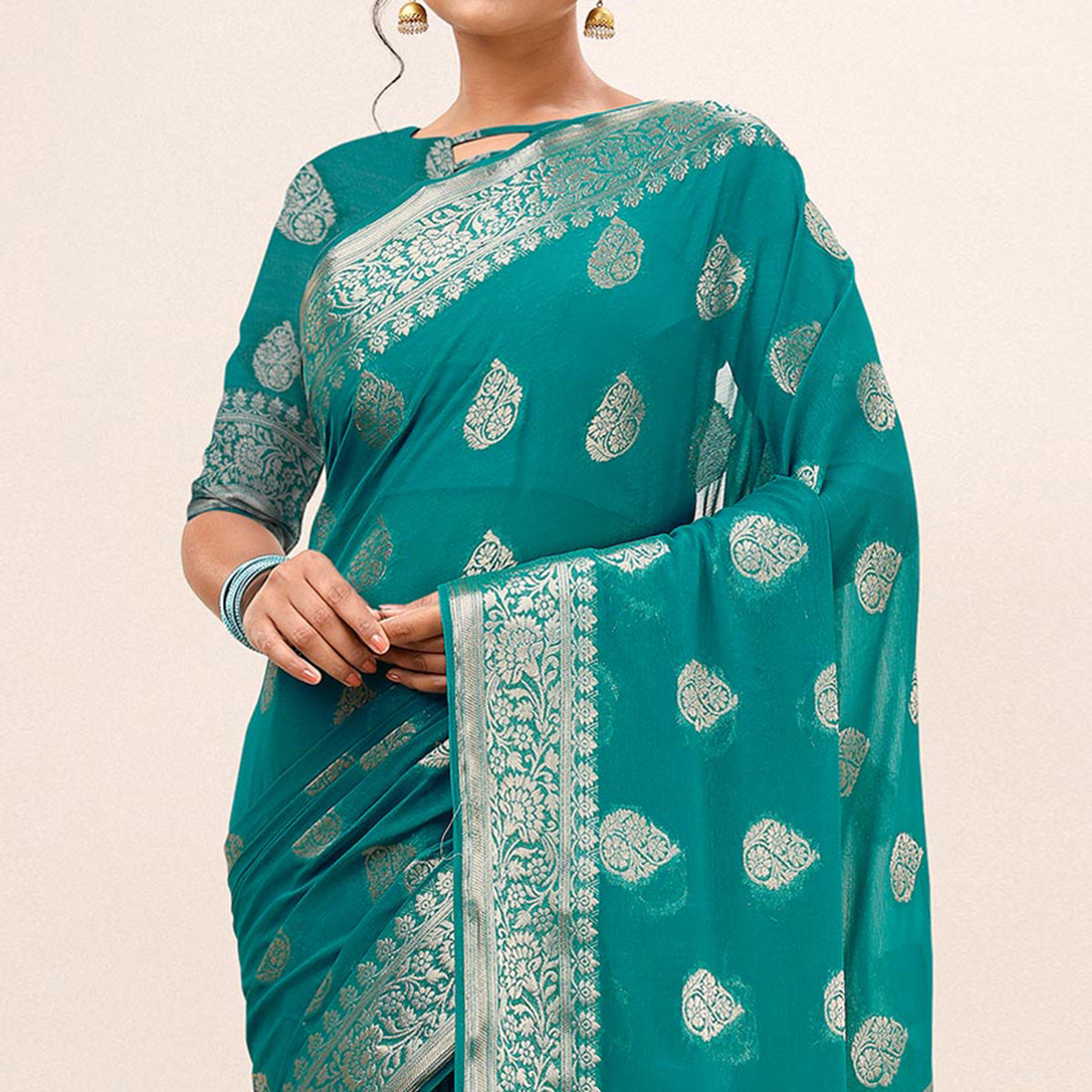 Turquoise Blue Woven Chiffon Saree With Tassels