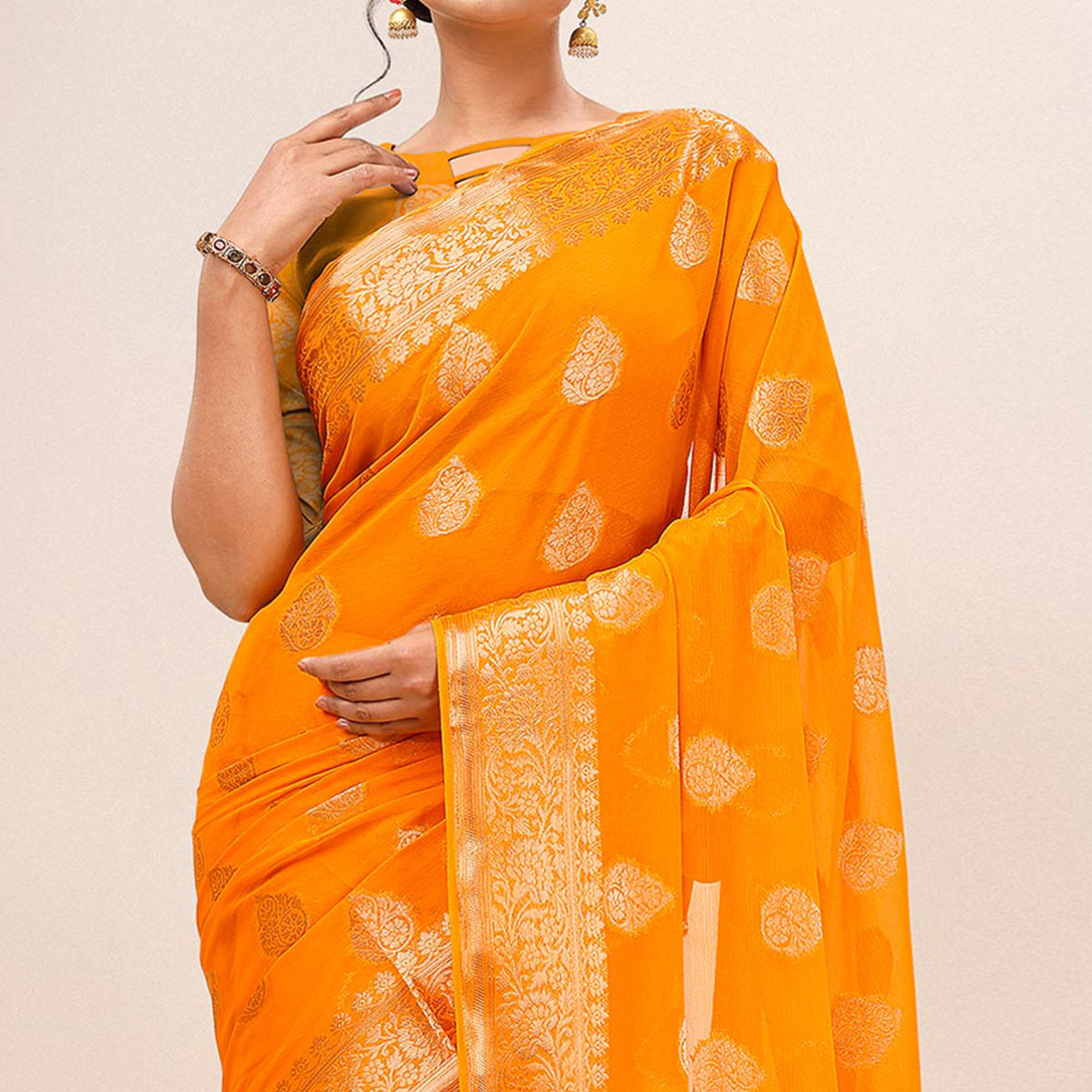 Yellow Woven Chiffon Saree With Tassels
