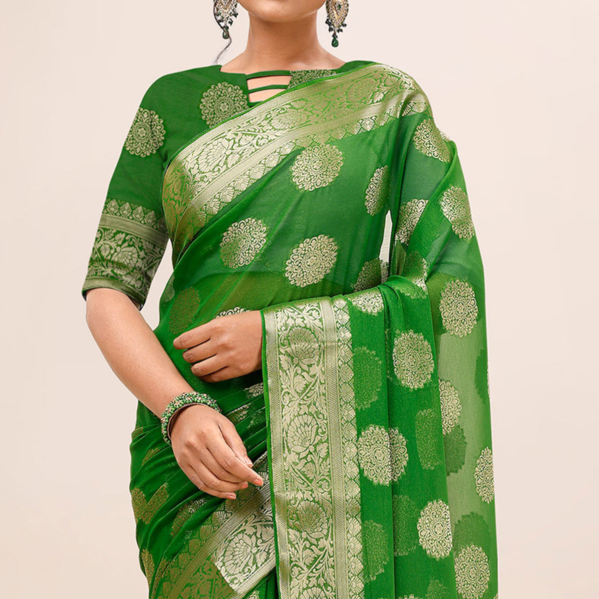 Green Woven Chiffon Saree With Tassels
