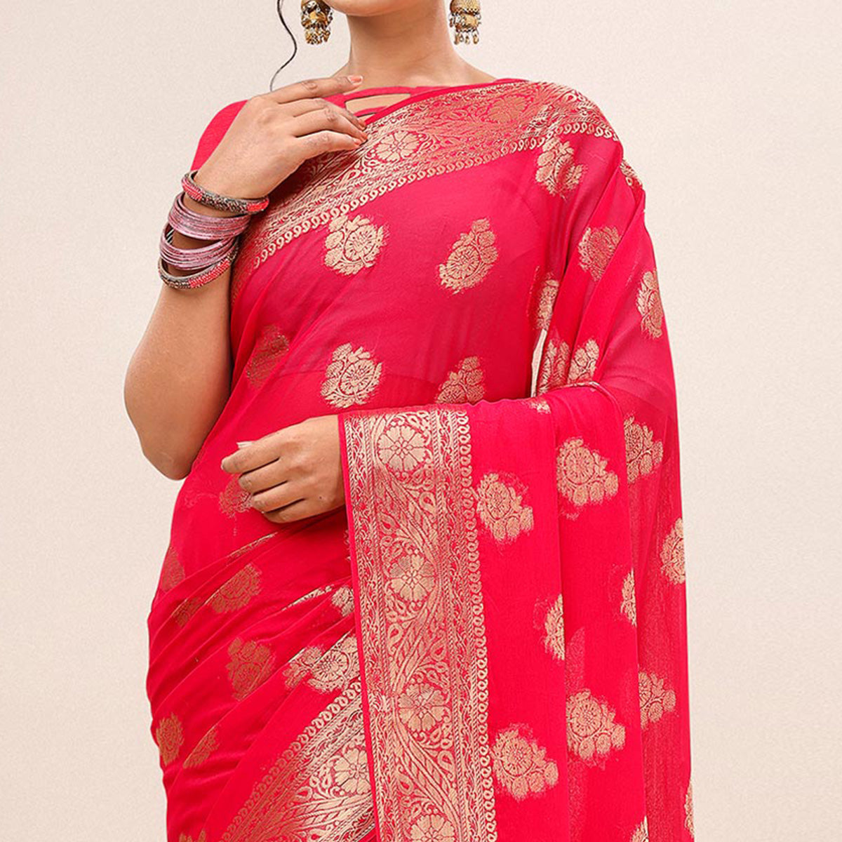 Pink Woven Chiffon Saree With Tassels