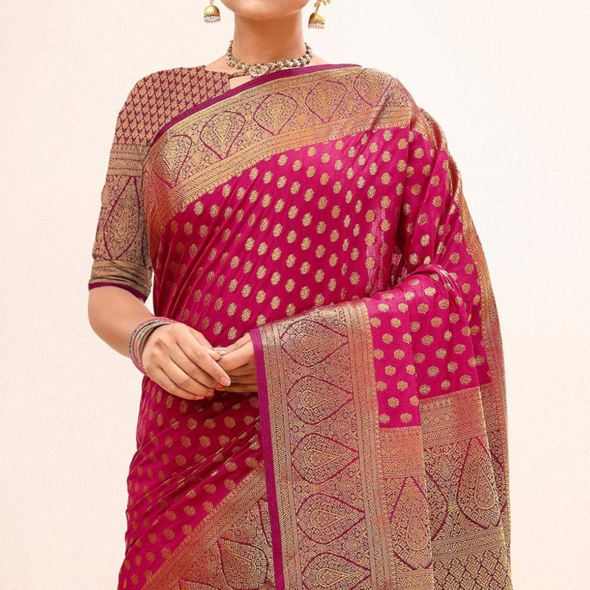 Rani Pink Woven Dola Silk Saree With Tassels
