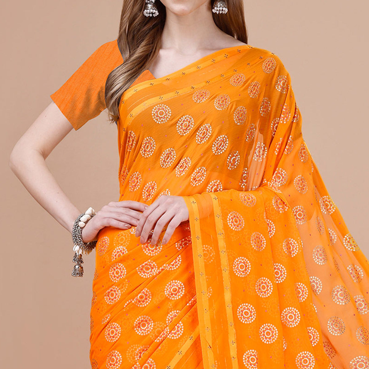 Orange Foil Printed Chiffon Saree With Tassels