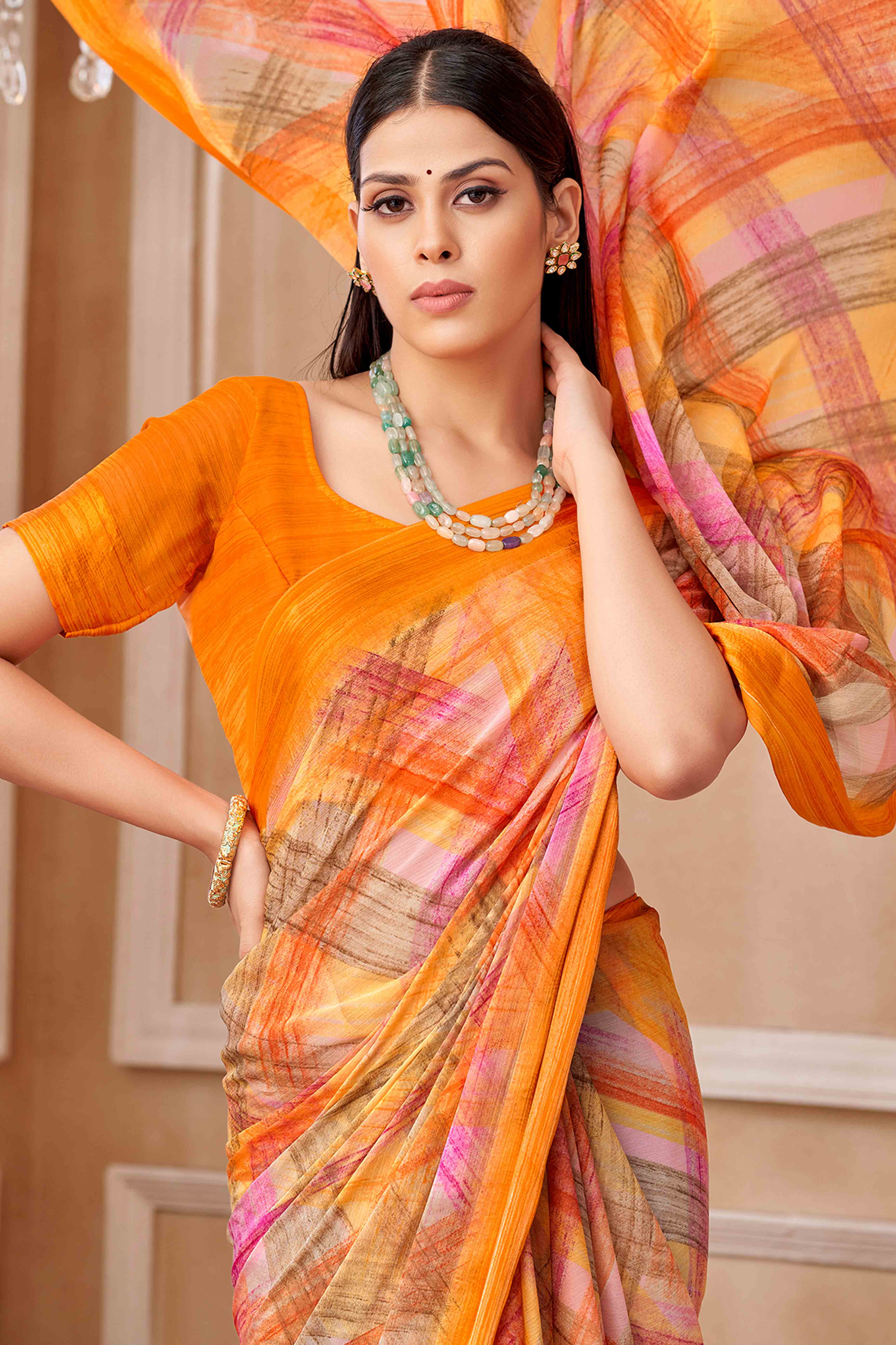 Orange Chiffon Saree With Delicate Prints & Elegant Satin Woven Border