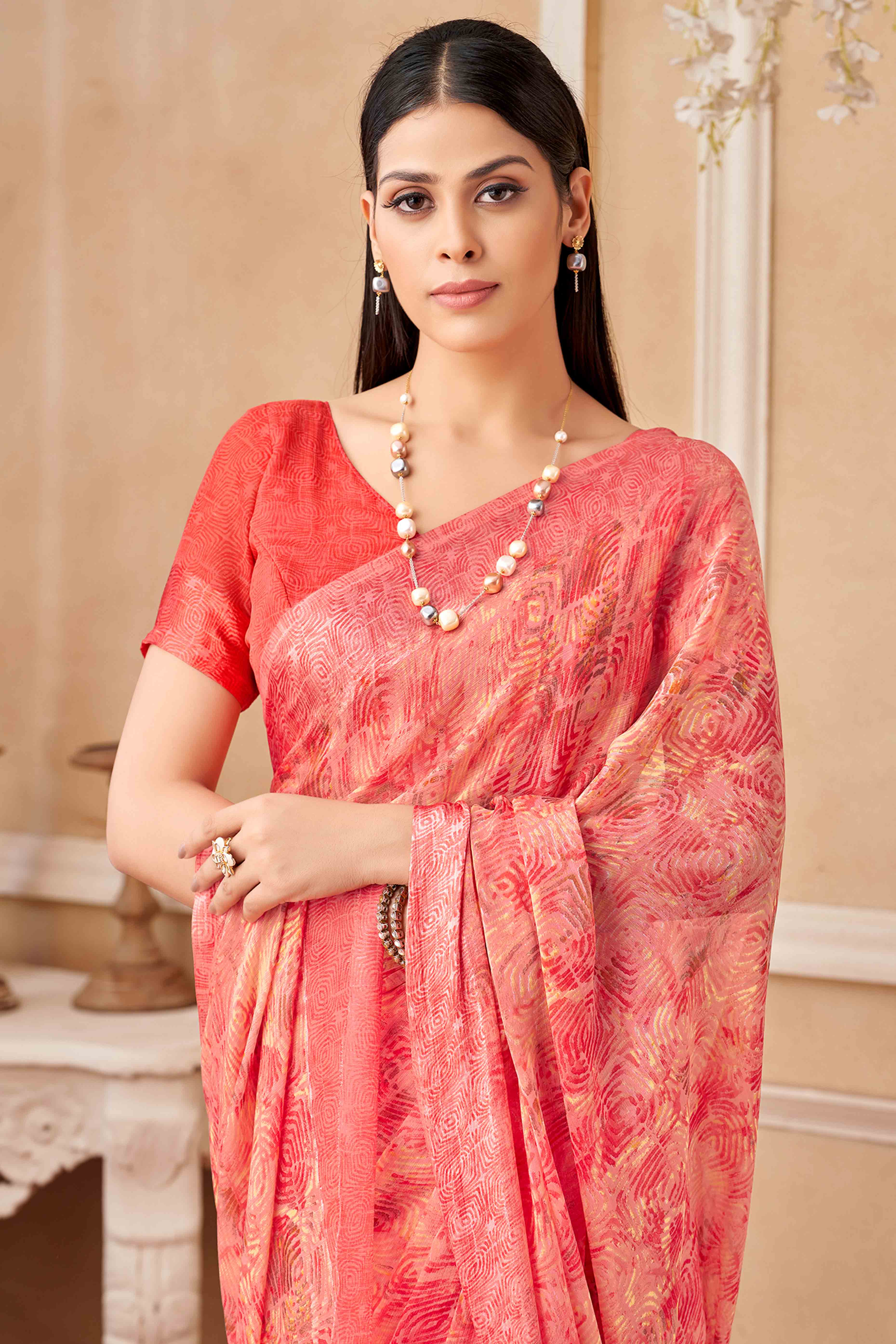 Salmon Pink Chiffon Saree With Delicate Prints & Elegant Satin Woven Border