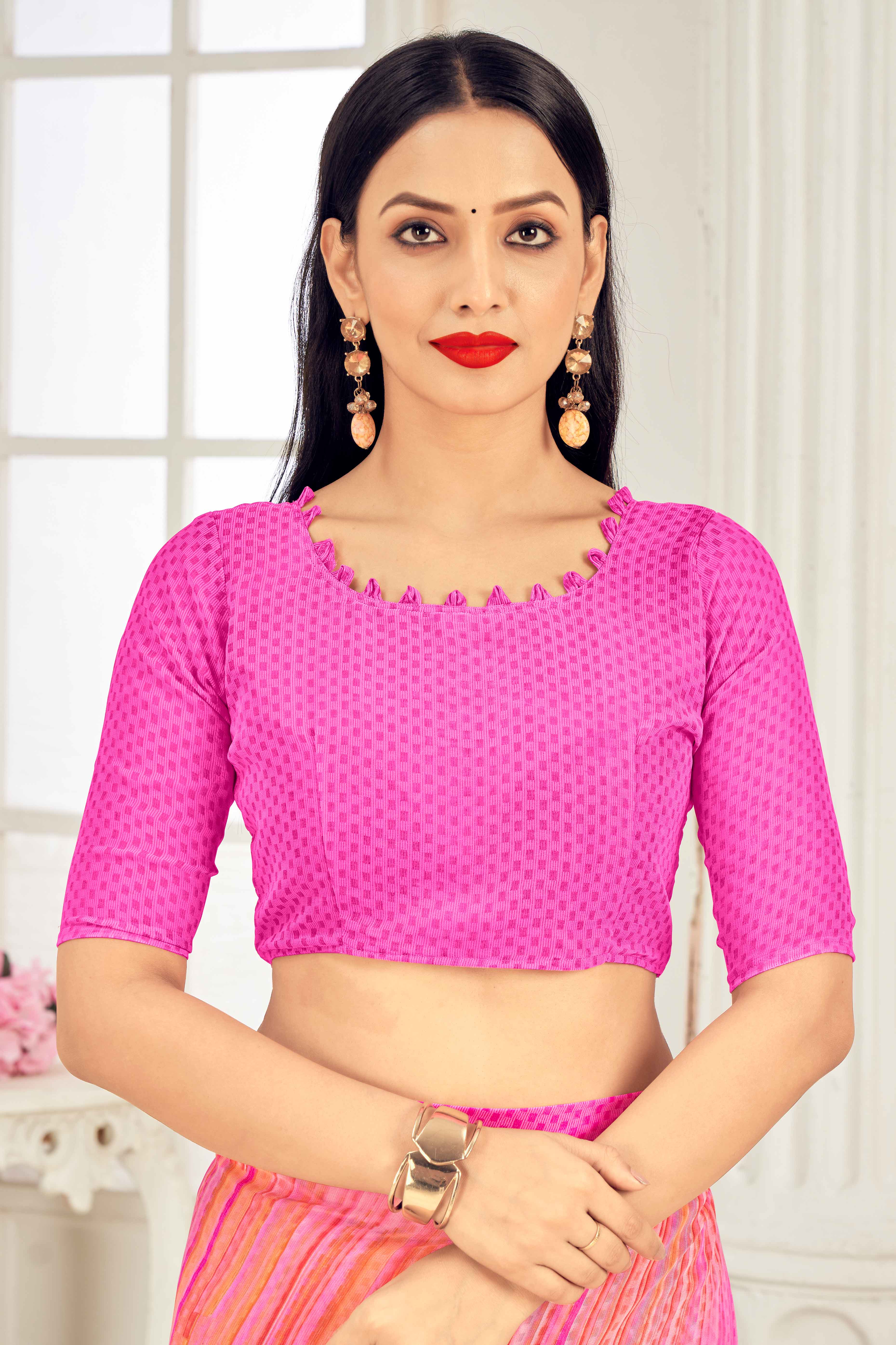 Pink Georgette Saree With Elegant Striped Print.