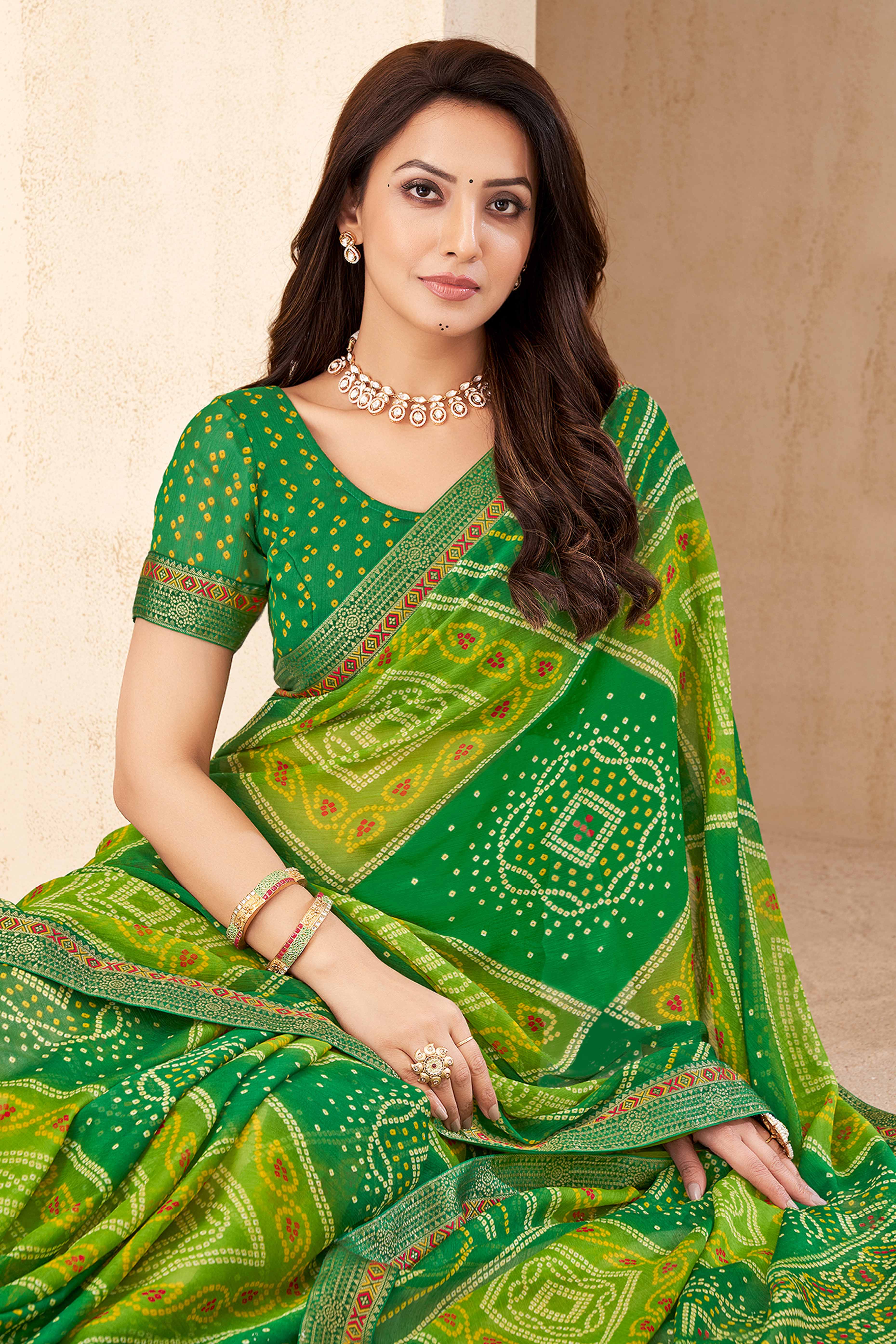Olive Green Bandhani Printed Chiffon Saree Enhanced with Delicate Lace Border Work
