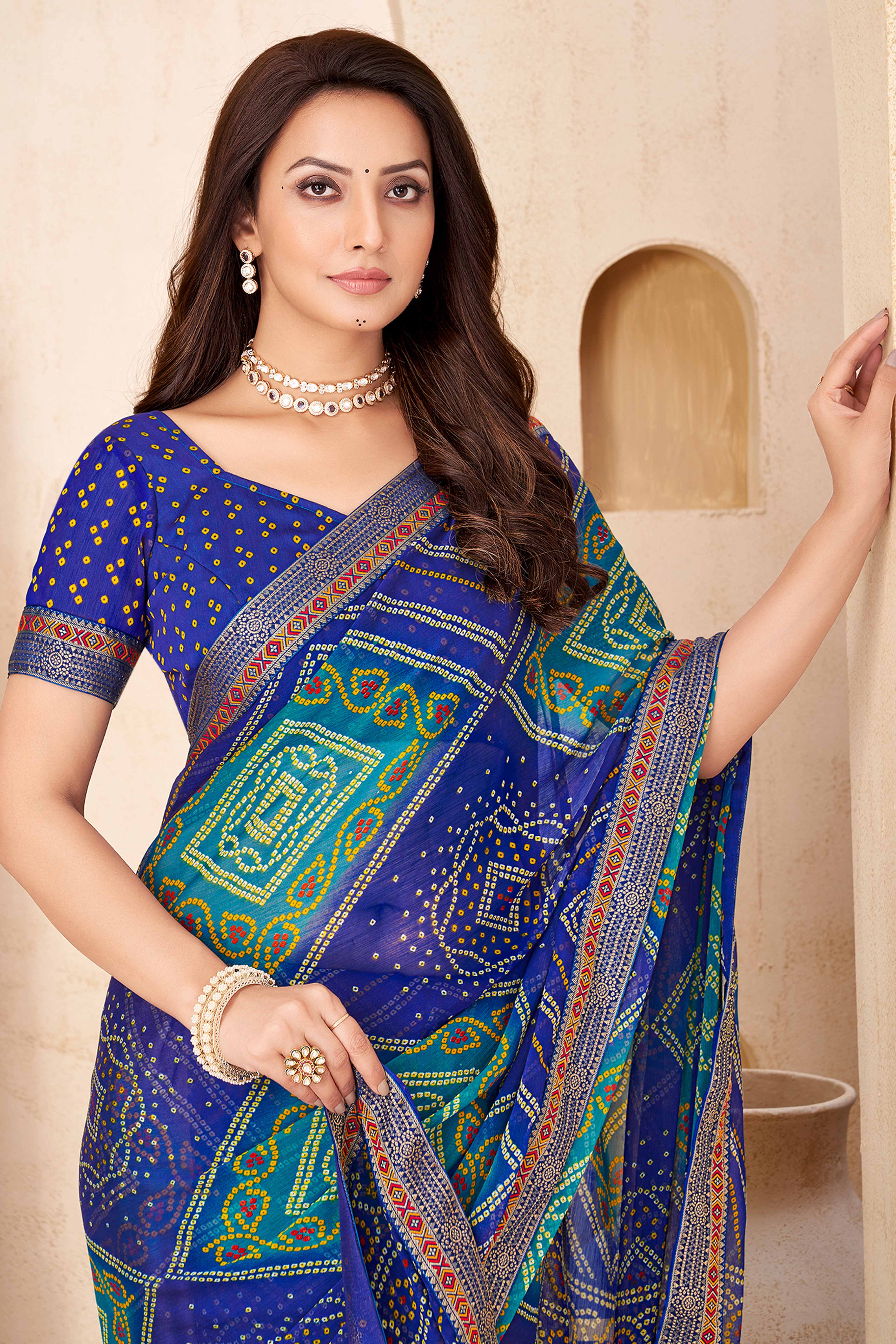 Blue Bandhani Printed Chiffon Saree Enhanced with Delicate Lace Border Work