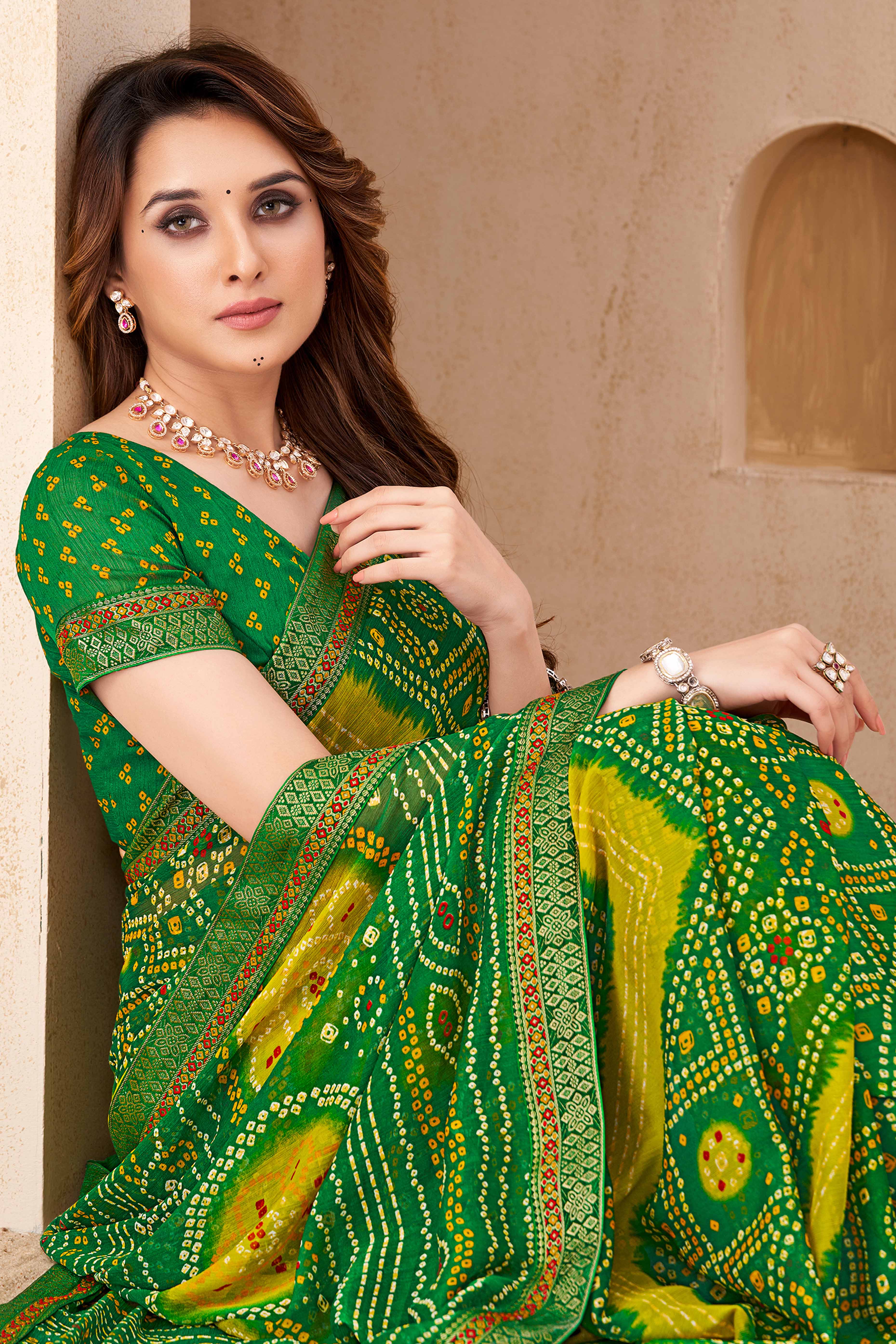 Green Bandhani Printed Chiffon Saree Enhanced with Delicate Lace Border Work