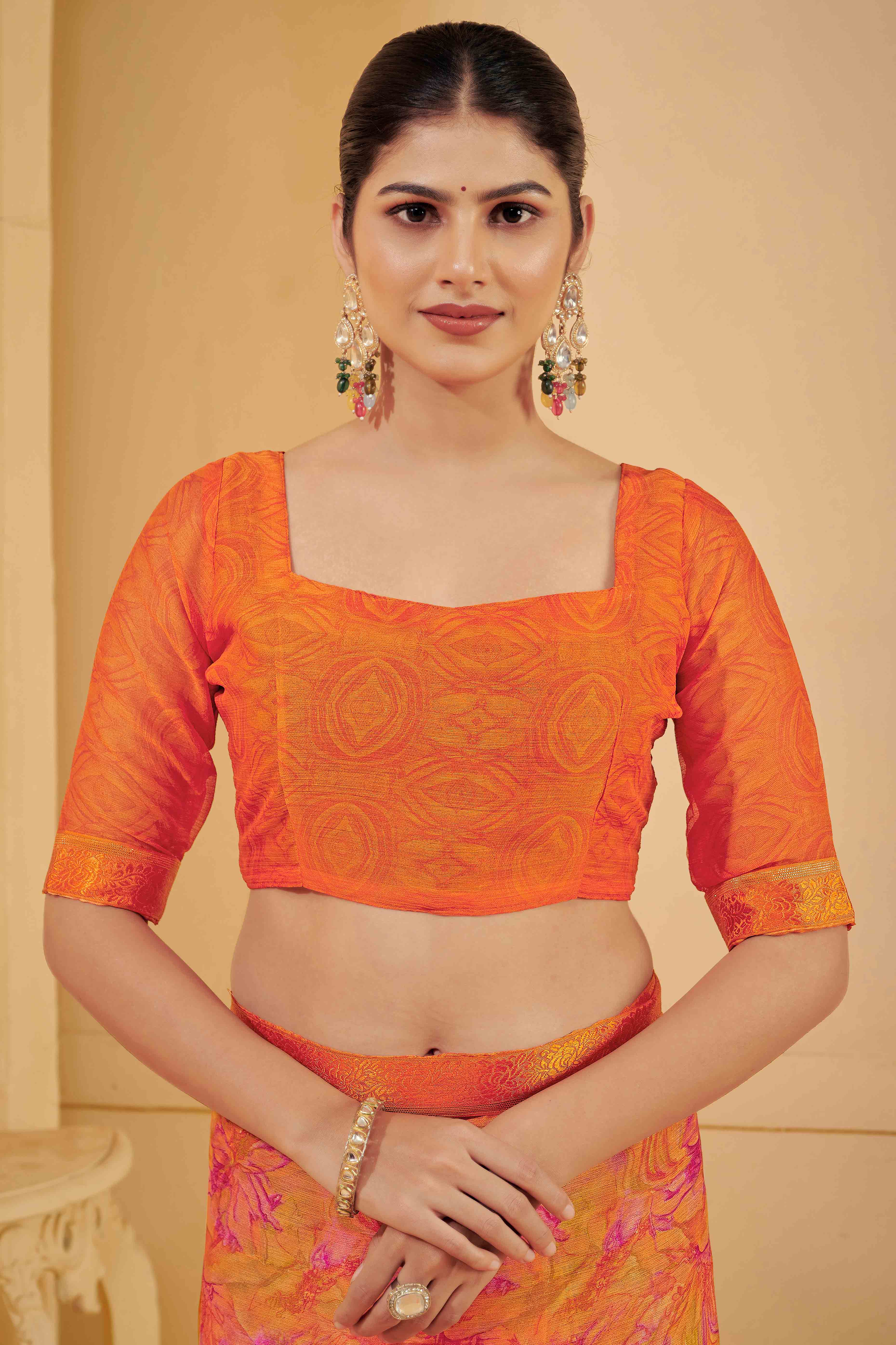 Orange Chiffon Saree Adorned With Artistic Floral Print & Finely Crafted Woven Lace Border