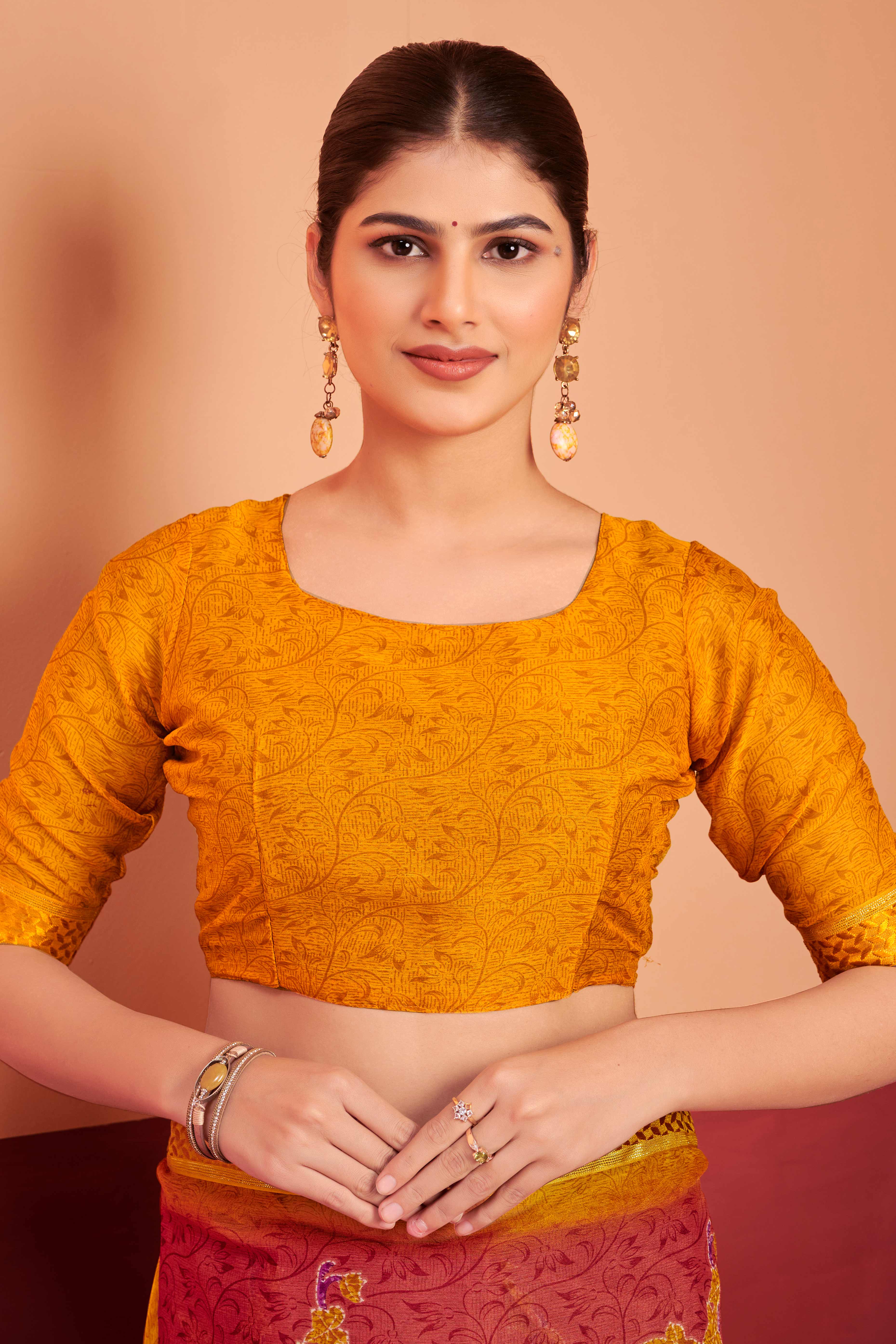 Brick Red Chiffon Saree Featuring Delicate Floral Prints & A Graceful Lace Border