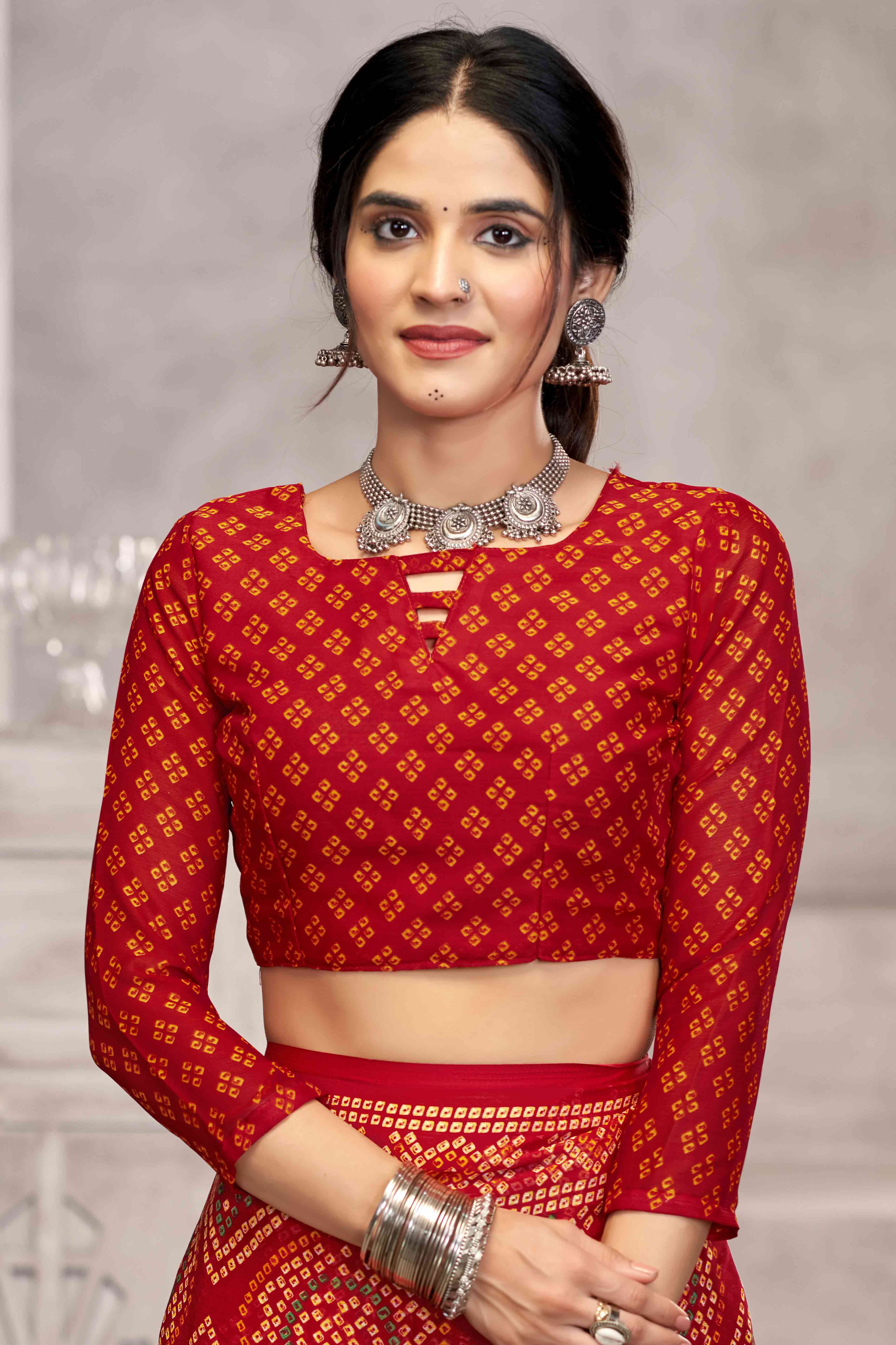 Red Chiffon Saree Features Bandhani Print for Casual Occasion