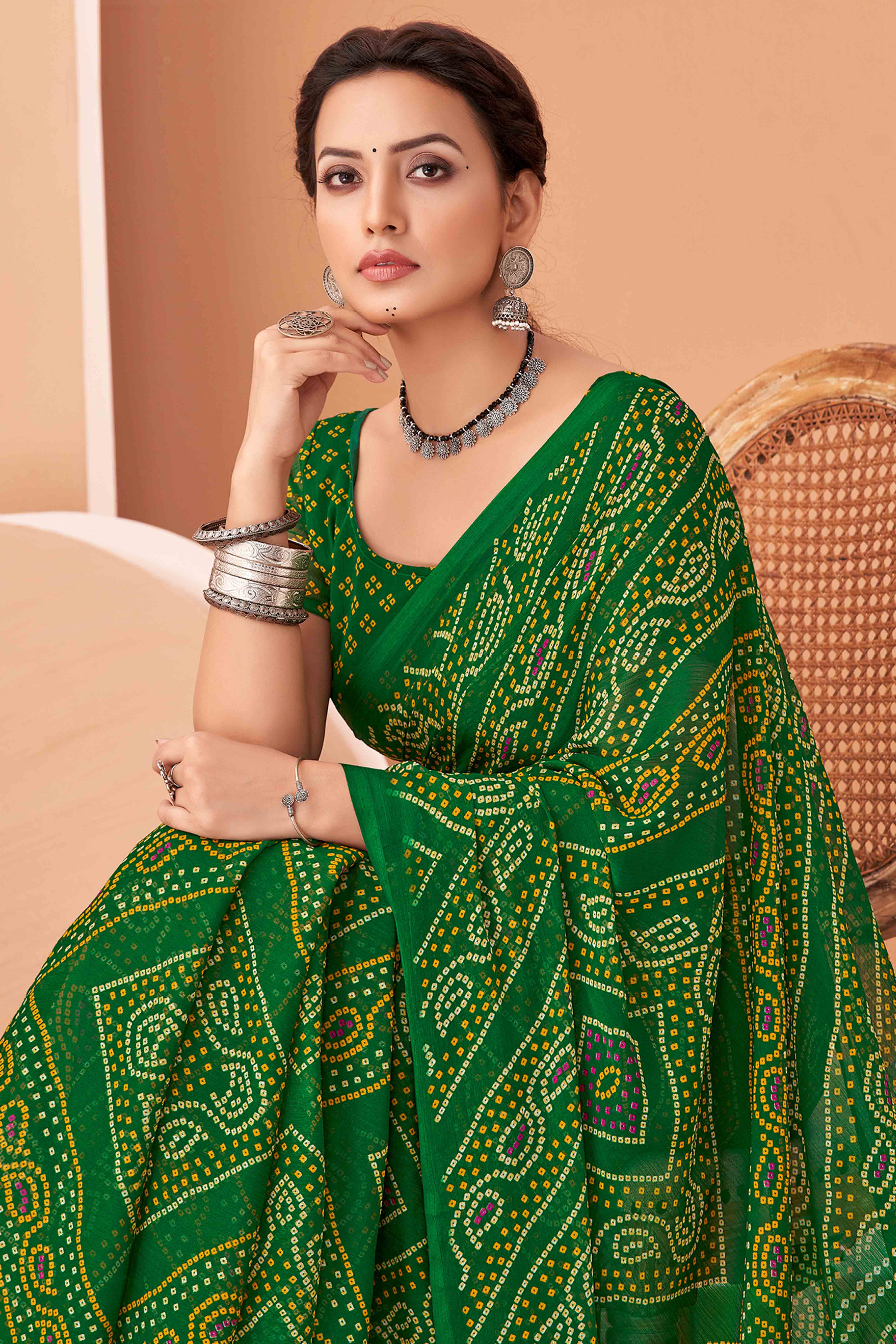 Green Bandhani Printed Chiffon Saree Accented With Intricate Lace Border Work