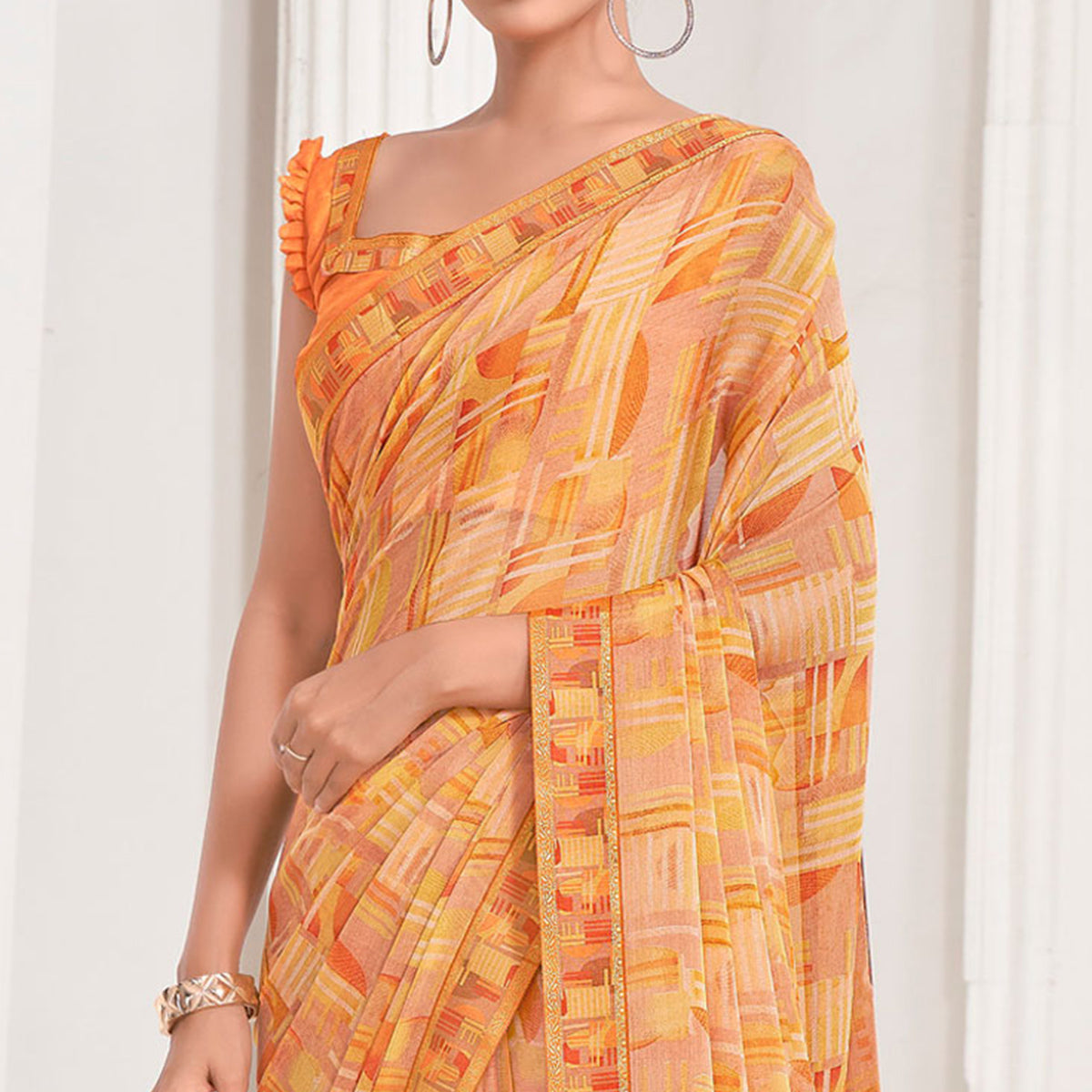 Yellow & Peach Geometric Printed Chiffon Saree With Lace Border