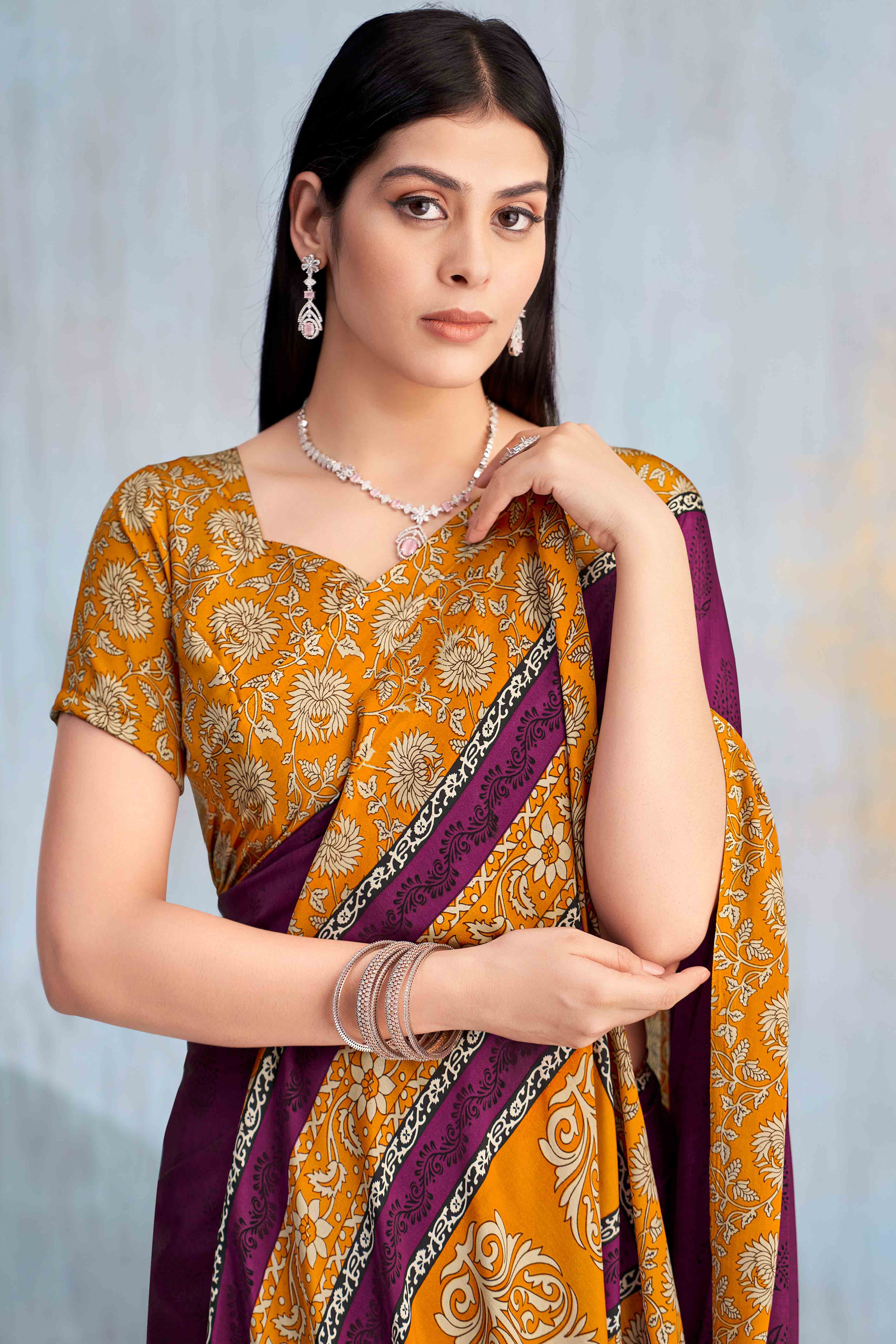 Dark Magenta Crepe Silk Saree Featuring Delicate Floral Print Work