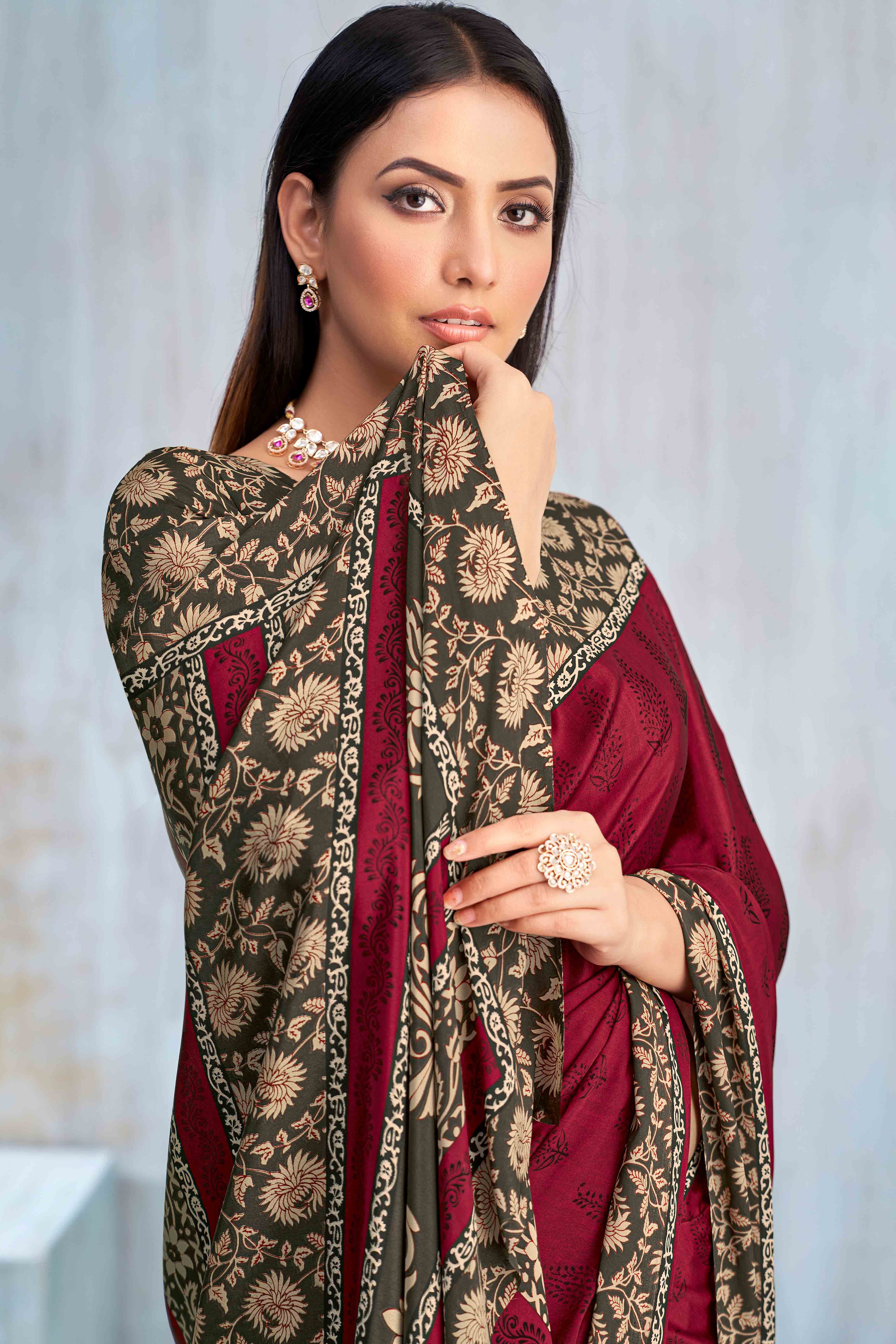 Maroon Crepe Silk Saree Featuring Delicate Floral Print Work