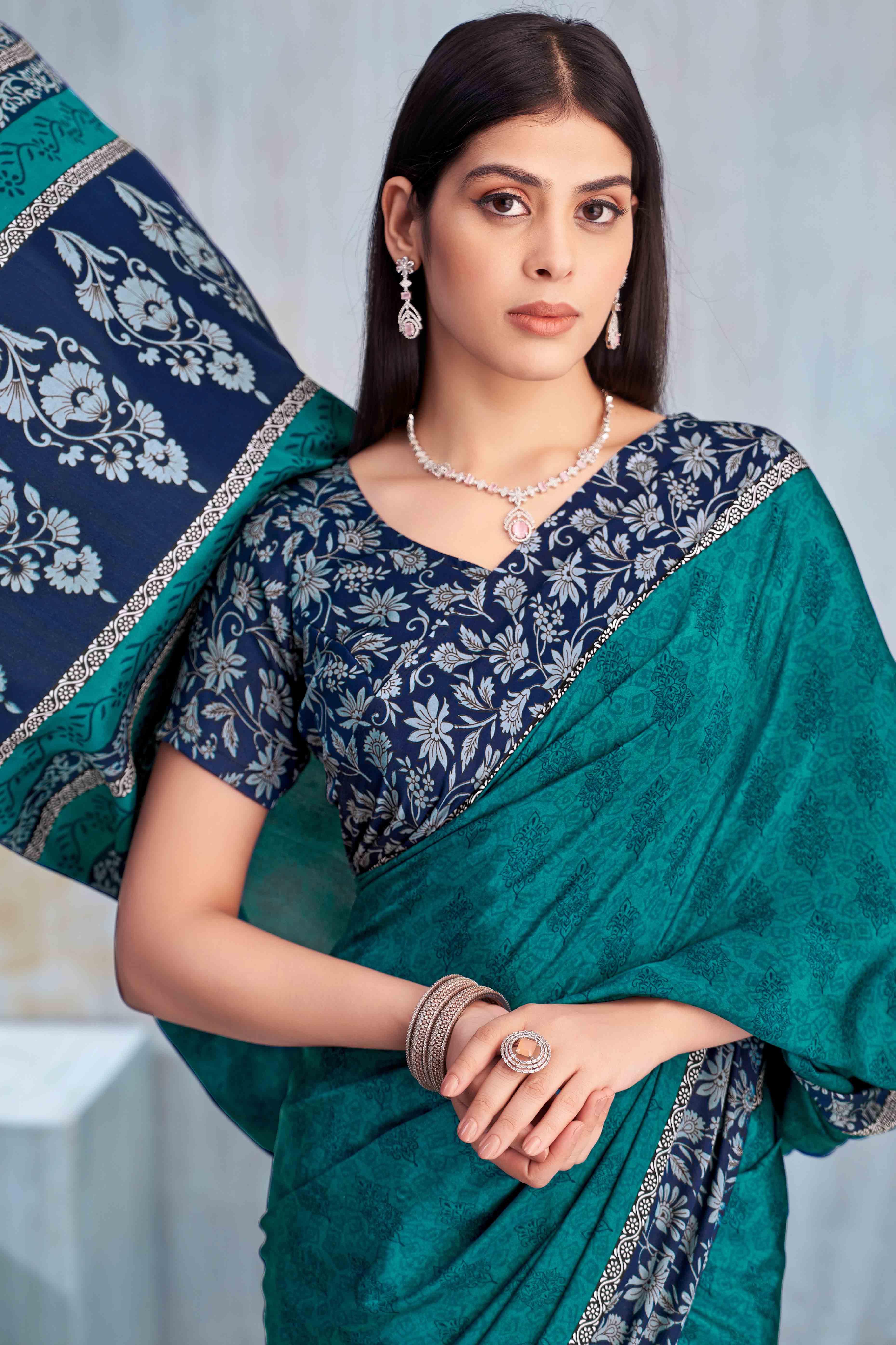 Teal Crepe Silk Saree Featuring Delicate Floral Print Work