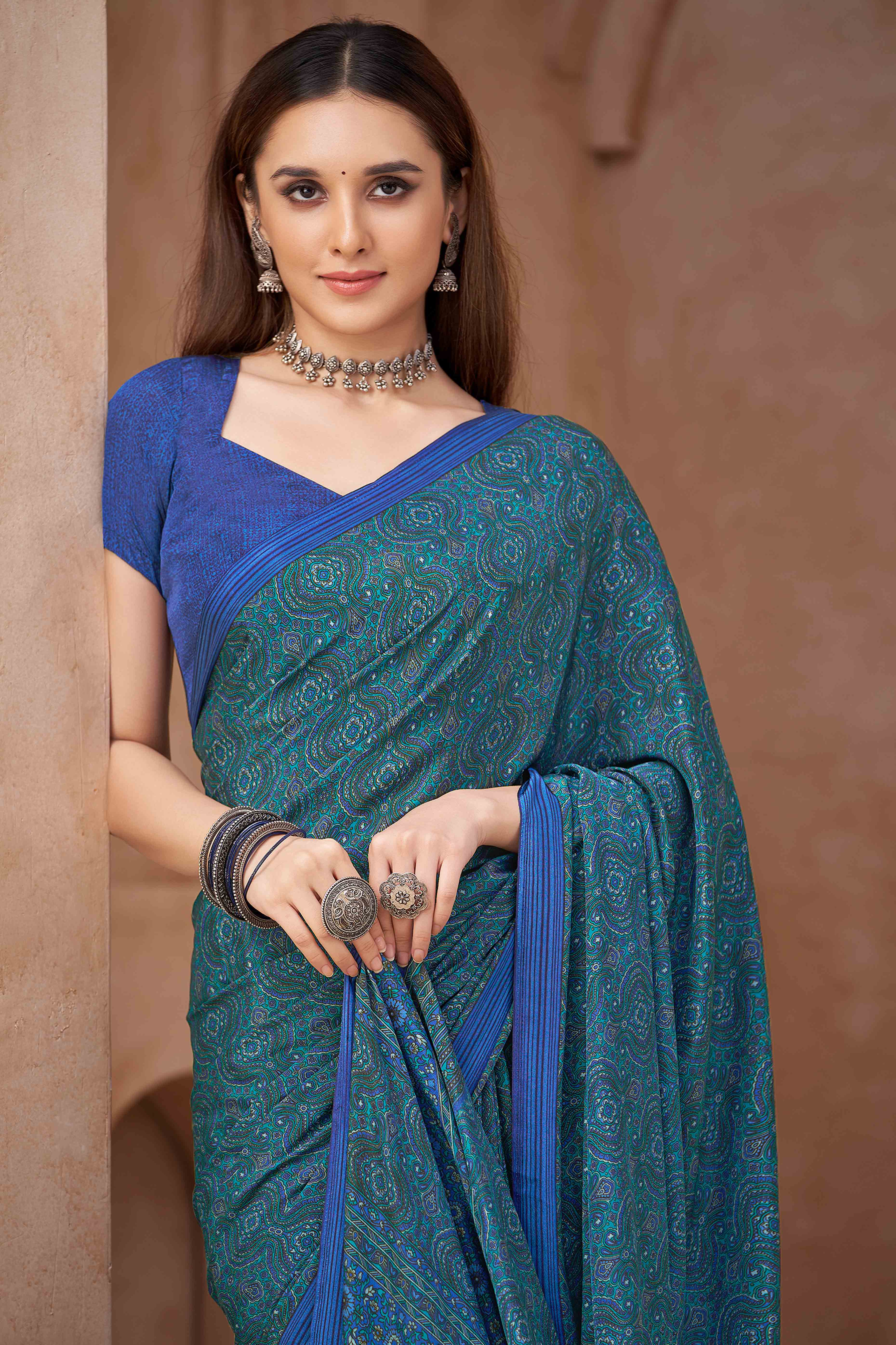 Blue Crepe Silk Saree Featuring Delicate Floral Print Work