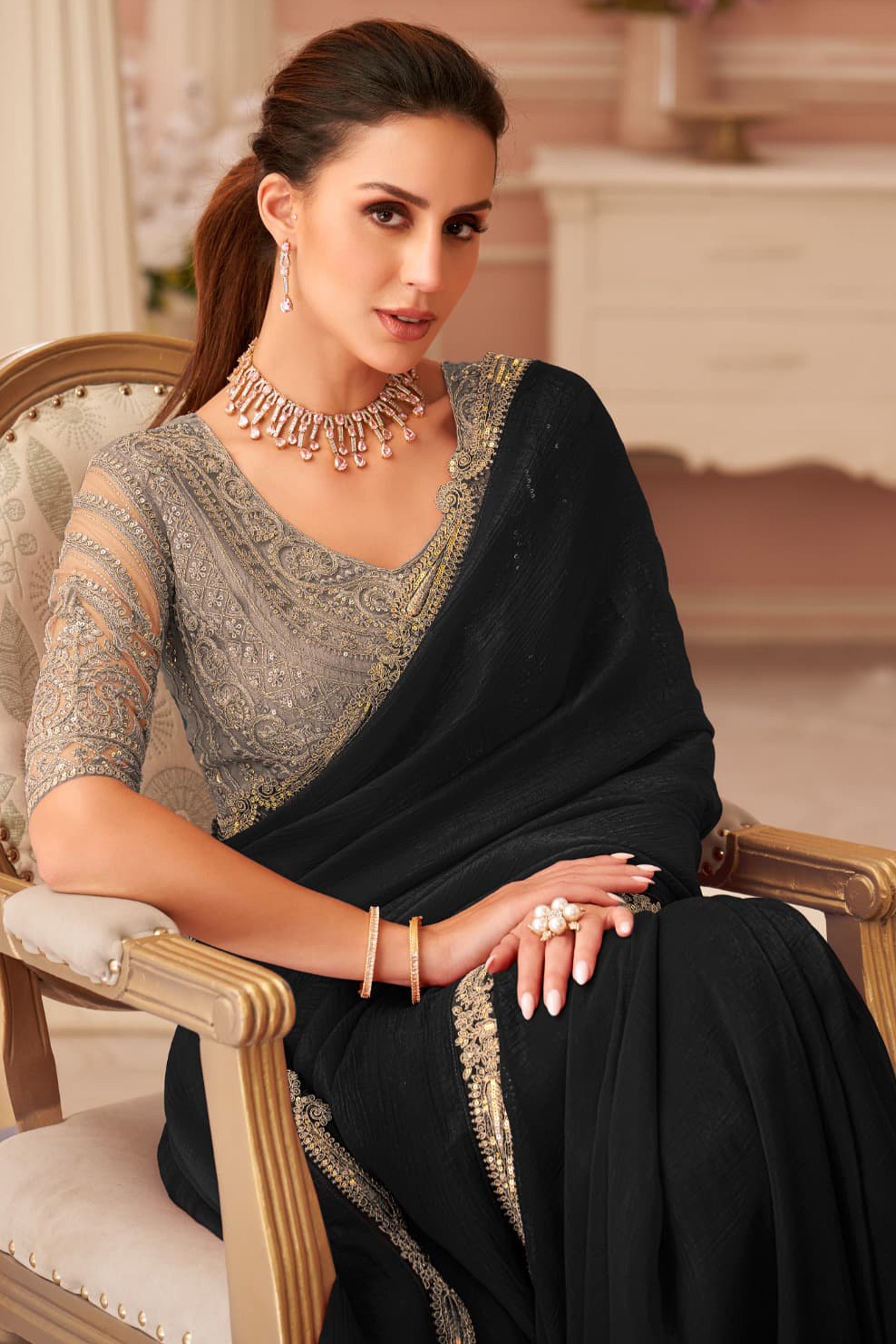 Graceful Black Georgette Saree with Intricate Sequin Embroidery Detailing