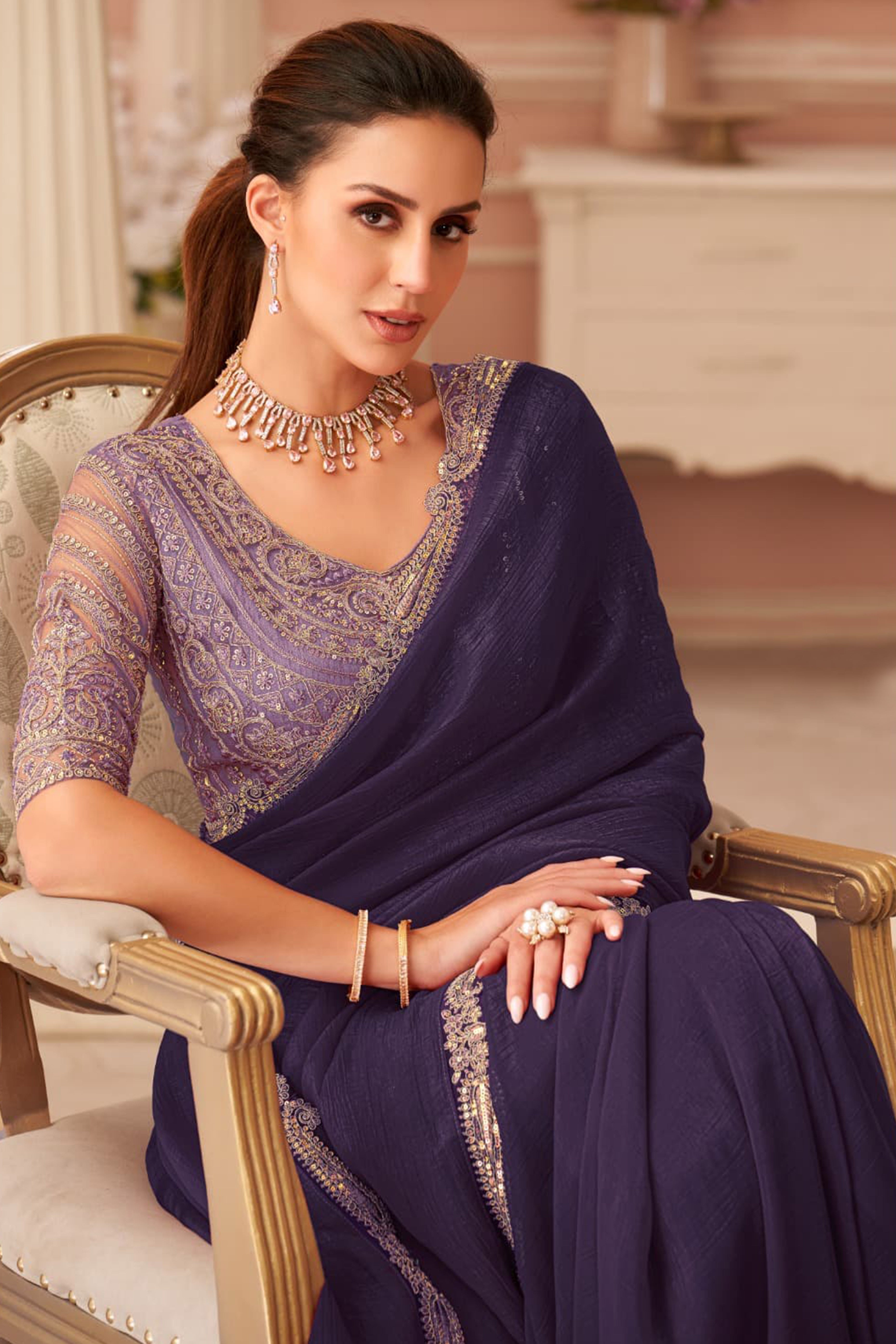 Graceful Purple Georgette Saree with Intricate Sequin Embroidery Detailing