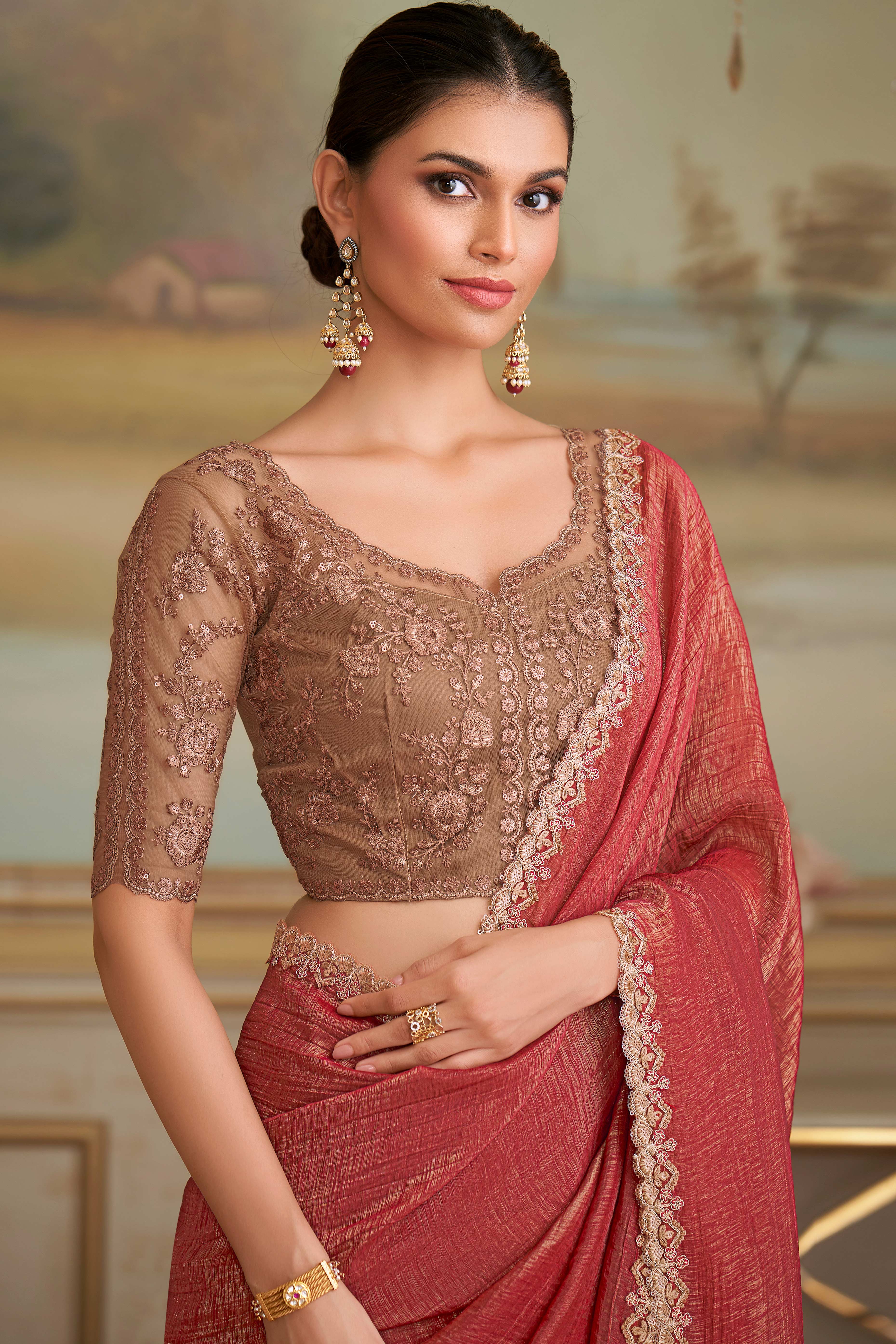 Graceful Brick Red Georgette Saree Adorned With Floral Sequins Embroidered Lace Border Work