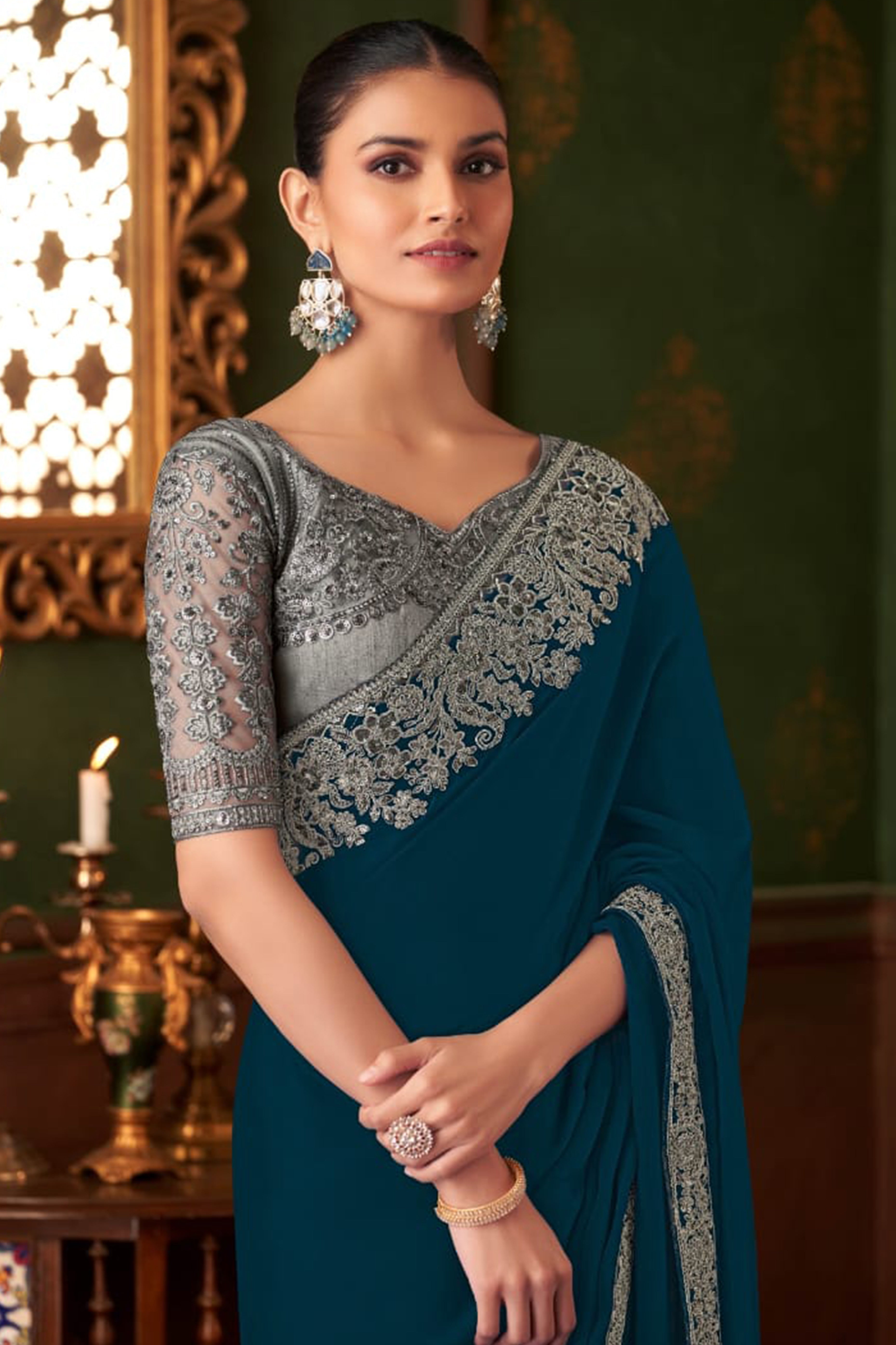 Graceful Blue Chiffon Saree Showcasing Exquisite Floral Thread Embroidery & Sequins Work