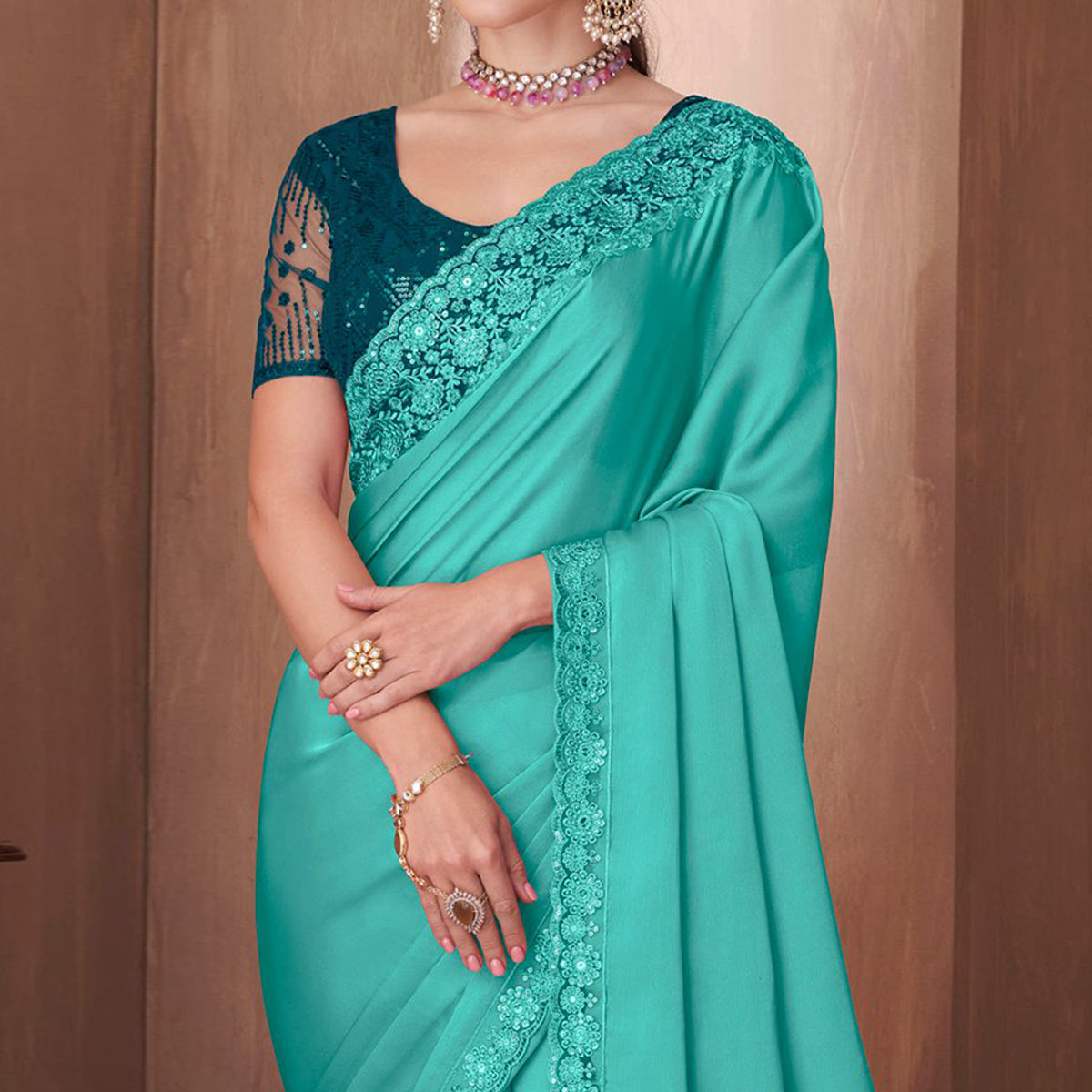 Turquoise Embroidered Satin Saree