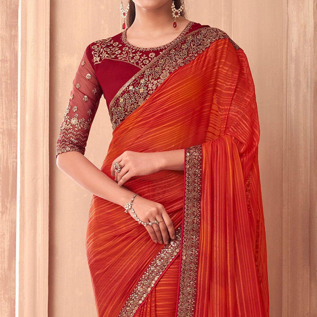 Orange Floral Embroidered Georgette Saree