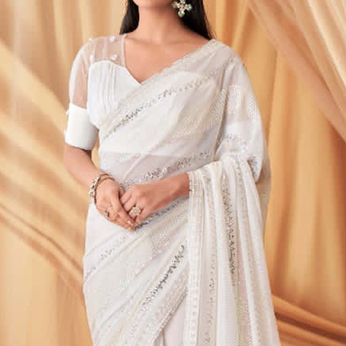 White Sequins Embroidered Georgette Saree With Tassels
