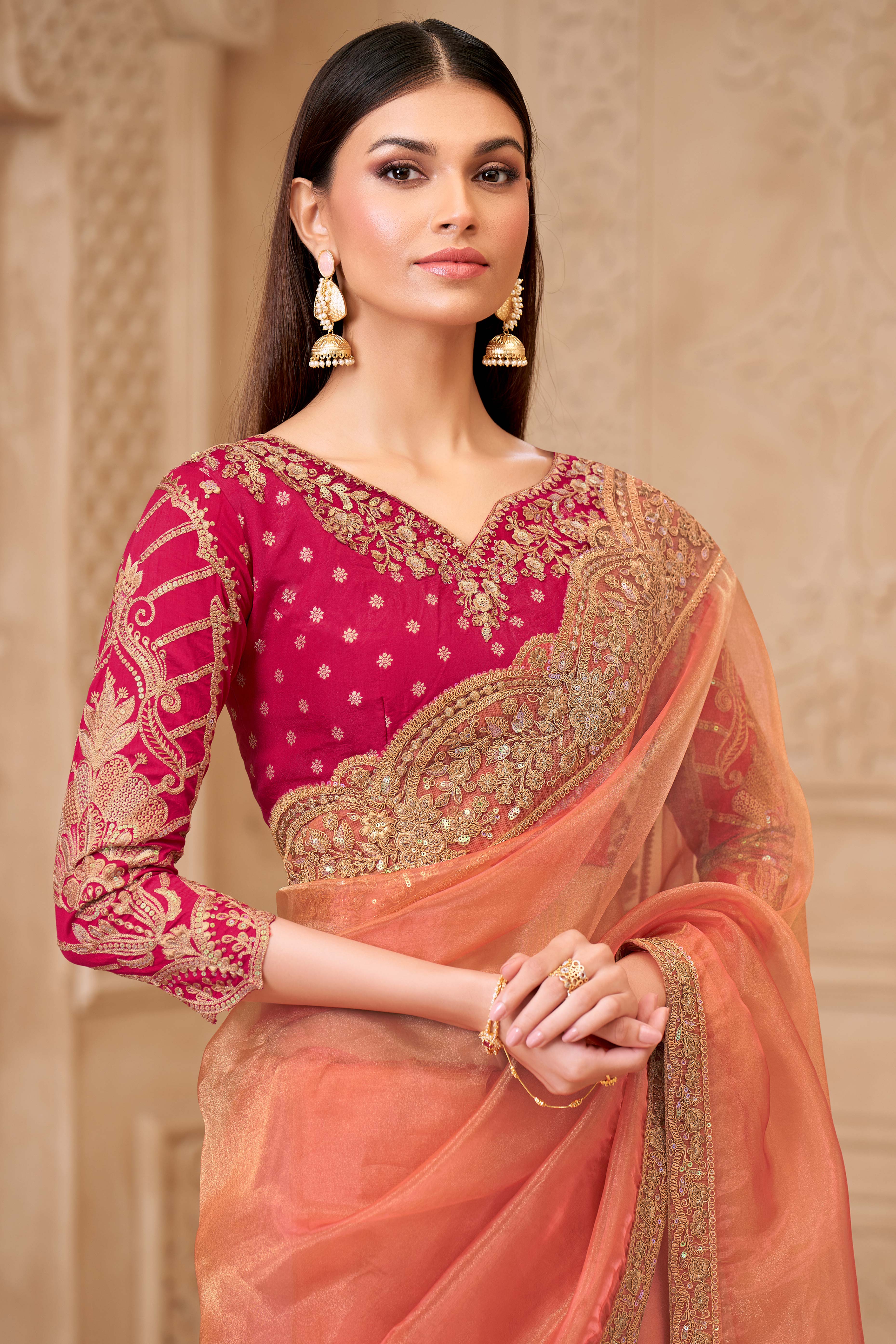 Shimmering Orange Georgette Saree with Graceful Thread Embellishment and Sequins