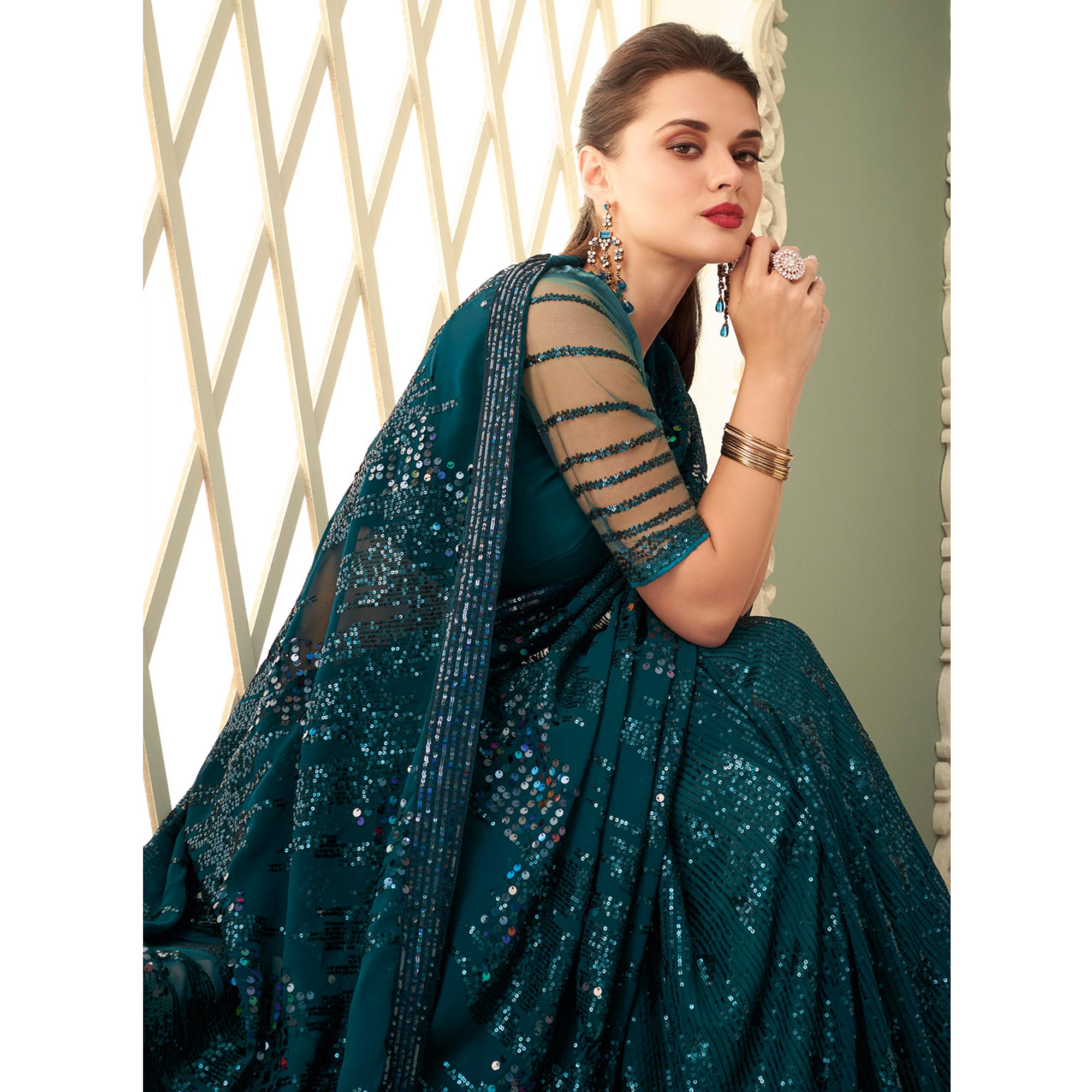 Teal Blue Sequins Embroidered Georgette Saree