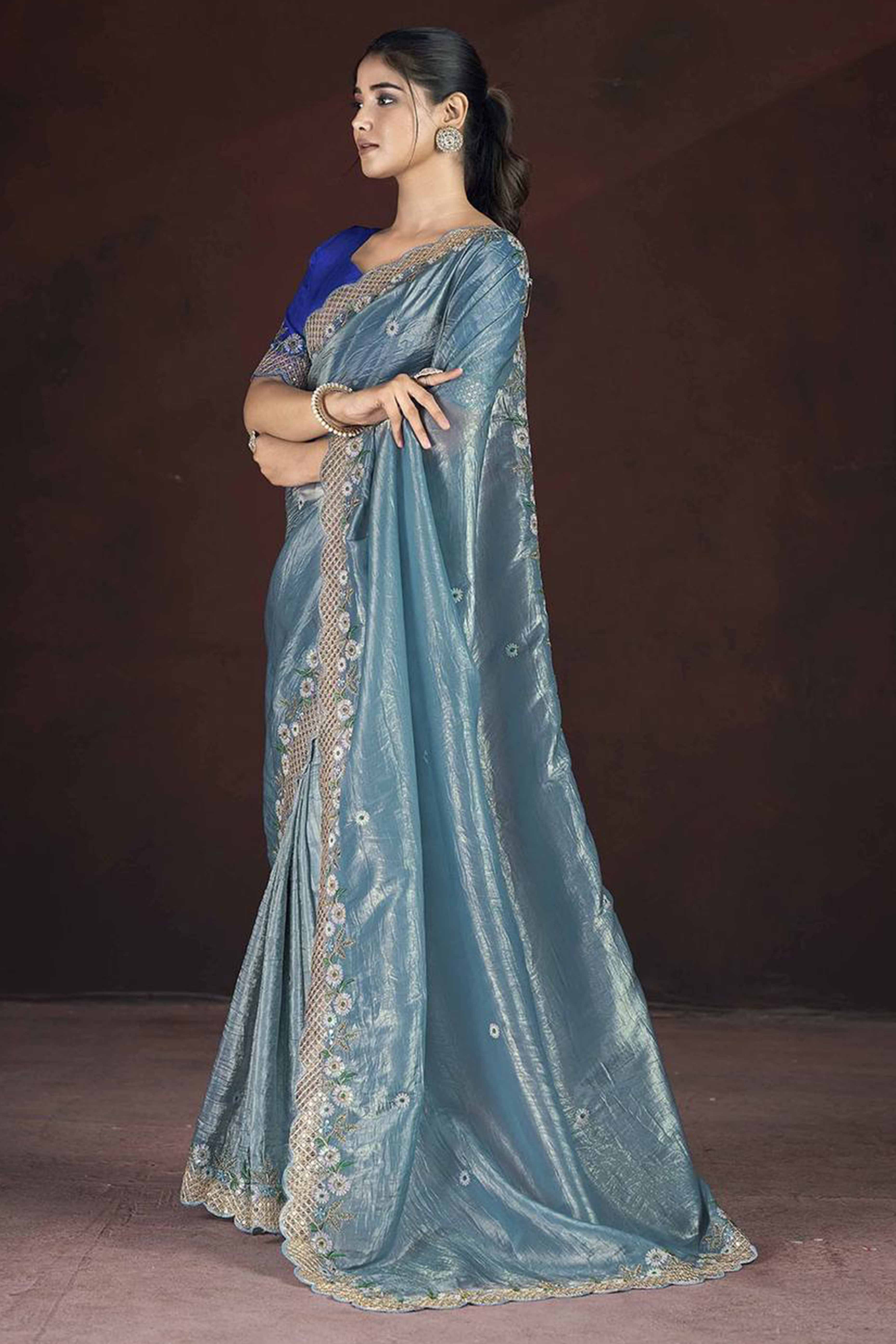 Blue Organza Saree with Embroidery on the Edges for a Graceful Contemporary Look