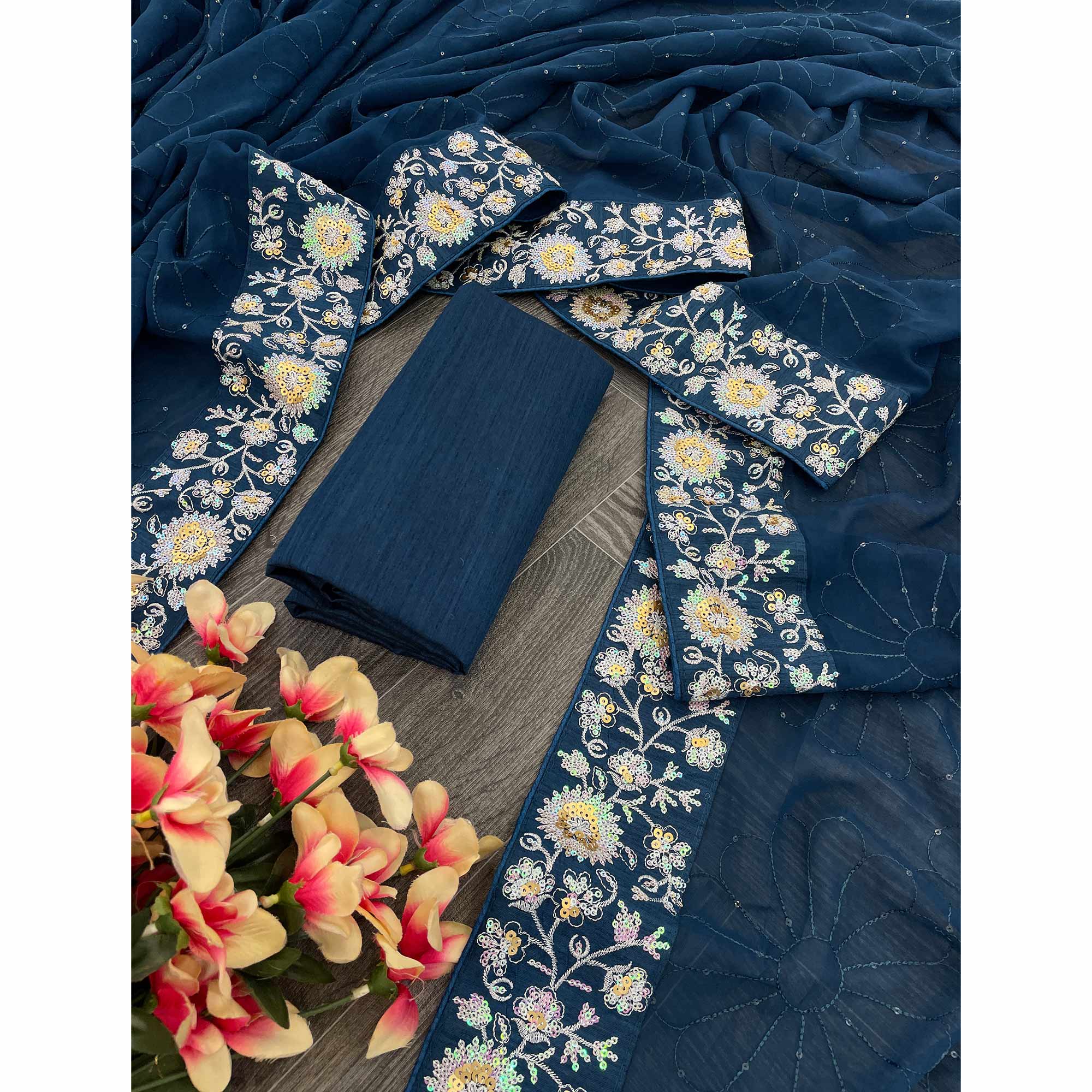 Teal Georgette Saree Featuring Fine Sequin Embroidery for a Glam Look