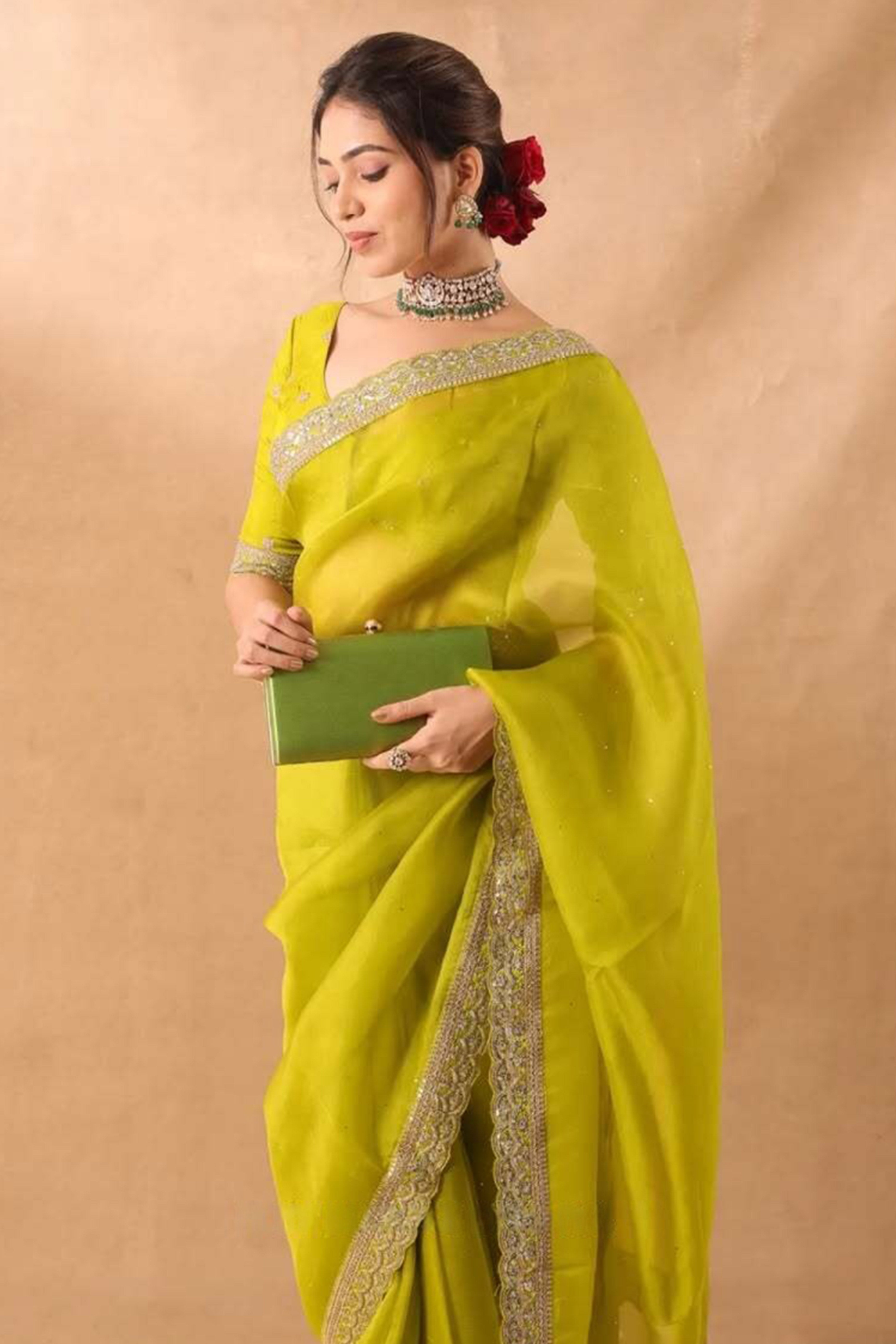 Lime Green Soft Tissue Saree Adorned with Alluring Sequin Detailing for a Luxurious Look