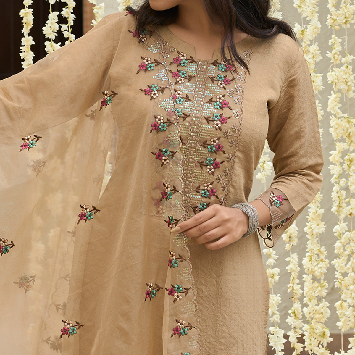 Chikoo Floral Embroidered Rayon Salwar Suit