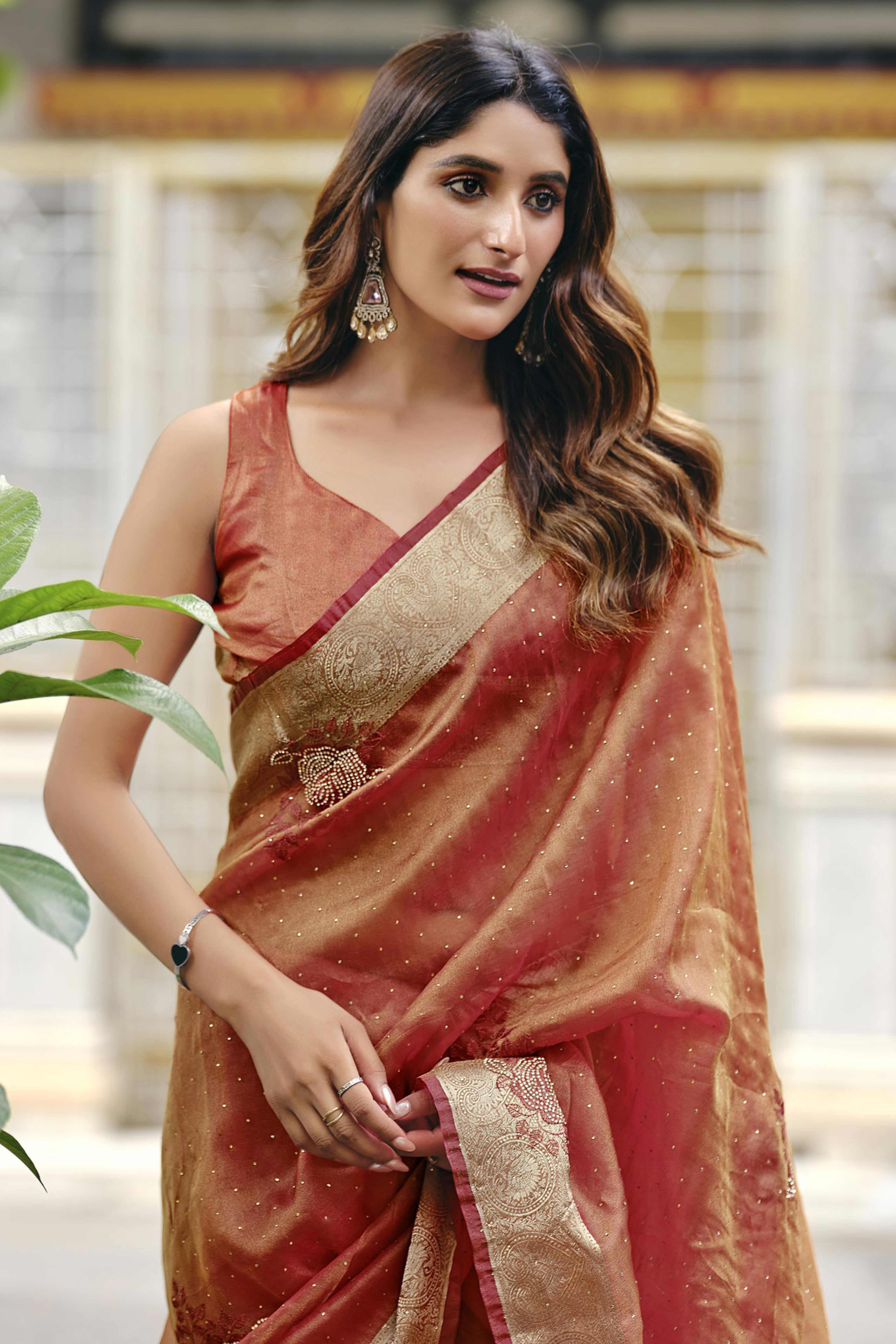 Warm Orange Nylon Saree Highlighted with Sparkling Stone Embroidery for Party & Festive Styling